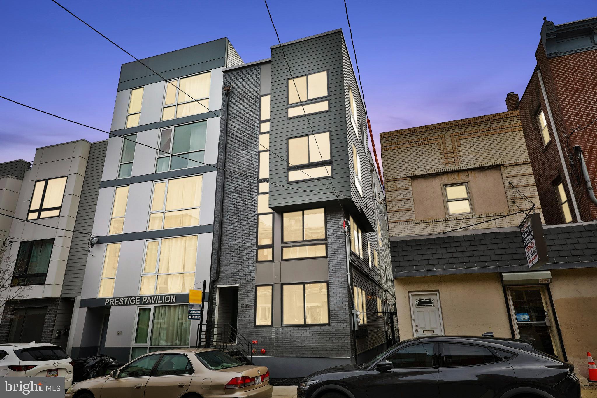 This home is the perfect mix of sleek style and modern convenience, guaranteed to impress. Located just off 5th and Girard, it's smack in the middle of everything—public transit, biking, walking, or ride-sharing to anywhere in the city is a breeze. The kitchen is a chef’s dream—white cabinets, sleek countertops, and marble touches in soft grey make it as beautiful as it is functional. Whether you’re whipping up a gourmet meal or just heating leftovers, it’s got everything you need. When the sun sets, the glass pendant lights over the island add a warm glow, flooding the living and dining areas with extra light. But here’s the kicker: this unit has a private backyard tucked away at the end of a lit alley, complete with plenty of space for your pooch to run wild or just to chill outside in peace.Inside, the bedrooms are spacious with two big closets each, and 10-foot ceilings that make the place feel extra roomy. This spot is close to everything: a 13-minute walk to Frankford Ave, 14 minutes to Liberties Walk and The Fillmore, and just 21 minutes to Franklin Music Hall. Plus, the trolley is only a block away! Don’t miss out—contact us today for more info about this amazing property!