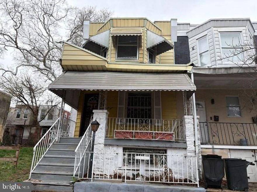 Two-story rowhome offering 3 bedrooms and 1 full bathroom with an unfinished basement and covered front porch. This property presents a great opportunity for investors or buyers looking to renovate and create value. Conveniently located near public transportation, local shopping, and major routes.