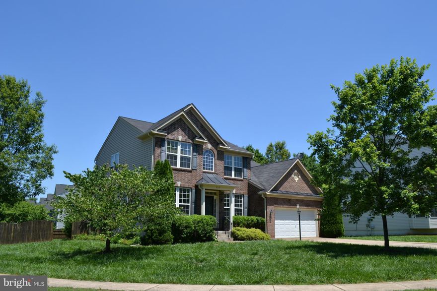 Fabulous brick front colonial includes fully finished basement w/ extra bath & 5th BR-all permitted. Fresh paint, carpets profess.cleaned, power washed exterior, mechanicals serviced, appliances like new, LED lights -  true move in ready home!! Spacious sized bedrooms. Open floor plan w/ loads of natural light. On large fenced lot w/ great rear deck for entertaining or playing.