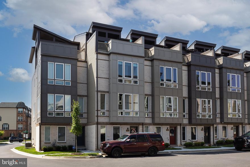 This stunning 1-1/2 year young, 4 level, 4 bedroom, 4 full bath townhouse in River Place is move-in ready! This contemporary home offers an open floor plan complete with LVP flooring. The ground level has a spacious bedroom, full bath and back loading garage with additional assigned on-street parking in front of the home. The upper level living room leads to the gourmet-style kitchen which includes quartz counters, stainless steel appliances and a large island/breakfast bar for food prep or friendly conversation. The second upper level houses the primary suite with a full bath and walk-in closet, another spacious bedroom, an additional full bathroom and the laundry room. The top level has a fourth bedroom plus another full bathroom. An oversized private balcony rounds out this nearly 2,000 sqft gem. Community amenities include jogging/walking paths, tot-lot/playground, picnic area and more. Close to commuter routes, shopping and dining.