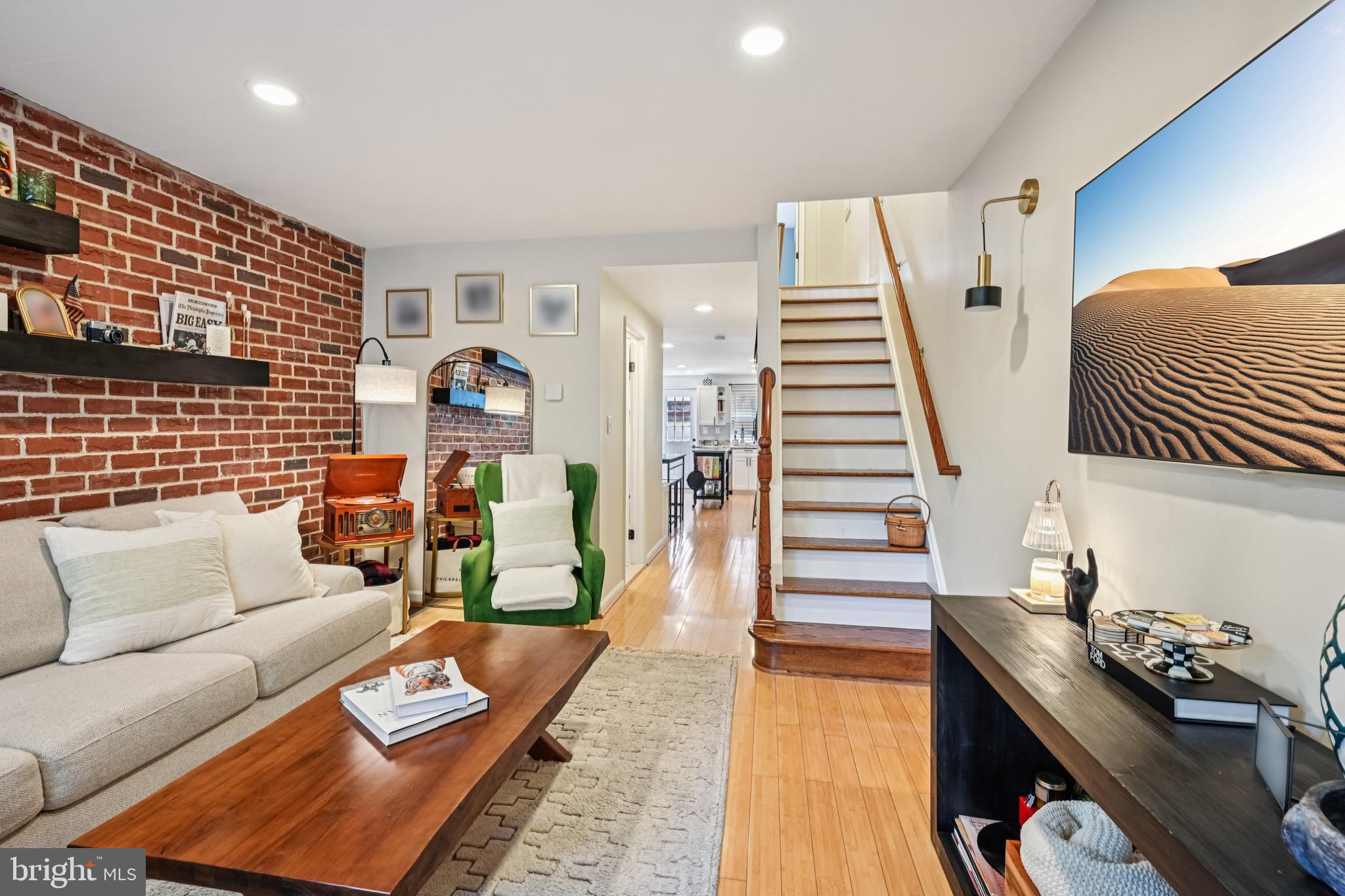 **OPEN HOUSE - Sun, Jul 13 2:30 PM - 4:30 PM**
Northern Liberties Charmer with Patio & Style — Ready for Your Summer Move-In!
Tucked on a tree-lined block in one of Philly’s most vibrant neighborhoods, 330 W George Street blends timeless character with modern comfort and convenience. This beautifully updated 3-story row home offers 3 bedrooms, 2.5 baths, and over 1,600 square feet of living space — including a rare private brick patio and side alley access, perfect for bike storage or weekend hangouts.
Inside, you’ll find exposed brick, bamboo floors, recessed lighting, and a welcoming eat-in kitchen with stainless appliances, pantry, and granite countertops. Upstairs, two bedrooms share a full bath and laundry closet (no more basement trips!). The third-floor primary suite is a true retreat — vaulted ceilings, skylights, oversized closets, and a spa-like bath with jacuzzi tub and glass shower.
The finished basement adds bonus space for storage or a flex area.
Live just steps from neighborhood favorites like GIANT Heirloom Market, Acme, Urban Village Brewing Co., Standard Tap, North Bowl, and Liberty Lands Park — plus access to top-notch gyms and some of the city’s most talked-about restaurants and nightlife along 2nd Street and Frankford Avenue. With a Walk Score of 98, this home puts the best of Northern Liberties and Fishtown right at your doorstep.