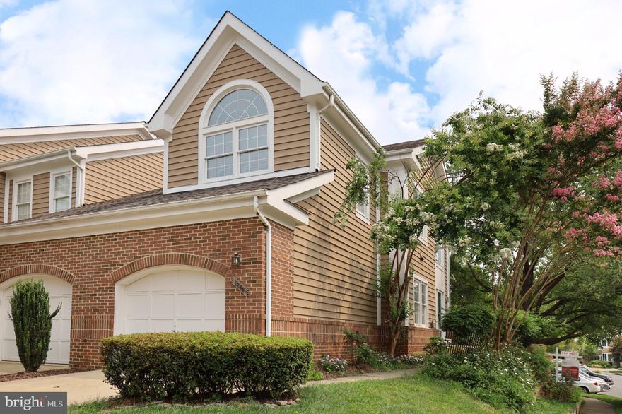 Open House on Sunday 3:00-4:00. You will love this luxury Townhome located in the desirable North Point section of Reston. This is a turn-key home in a small, well-maintained private cluster near the Reston Town Center with all your favorite shops, restaurants and the Metrorail station. With over 3,200 square feet and fresh paint throughout, this home boasts three fully finished levels and a garage with a concrete driveway. From the front door, there is a sweeping two-story foyer with palladium windows. The main level features a spacious Living Room, Dining Room, a Cook’s Kitchen with a gas Viking range, stainless-steel appliances  and new under cabinet lighting that opens to a Breakfast Nook and a Family Room with a Gas Fireplace. The deck is right off the Family Room for relaxing and summer barbeques. Step upstairs to 3 ample-sized Bedrooms, 2 full Bathrooms and laundry area including the Primary Bedroom with a vaulted ceiling and private Bathroom with a jetted tub and new tile flooring. Then check out the new carpet on the basement stairs leading to the walk-out Recreation Room to the backyard patio. The Recreation Room features  new luxury vinyl plank flooring, custom real-wood log walls and a wet bar nook with a new sliding glass door to the back patio with new slate stairs leading to the front door. Plus there is a Bonus Room that is perfect for an office, another Full Bathroom and a Storage Room. This home has it all and just five minutes to everything - shopping, dining, Metro, medical, sports facilities, running trails across the street, and access to the Reston Community Center, including pools and tennis courts!