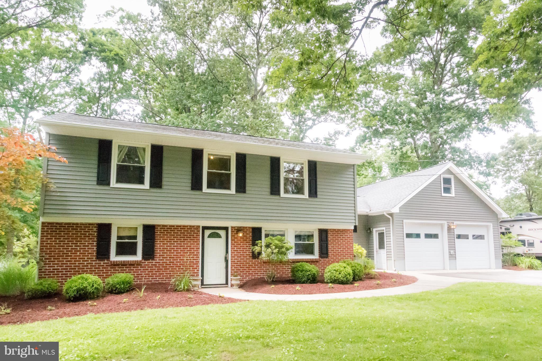 Smartly designed home with open floor plan in North Town Creek. Updated kitchen w/ corian counters, recessed lighting, prep sink, & tiled floors. Family RM w/ cozy steel lined fireplace & vaulted ceiling. Extra room for den or workout space. Oversized 2 car garage w/ lots of storage above. Peaceful landscaped lot w/ spacious deck, hot tub, & firepit. Plenty of parking. Call today!