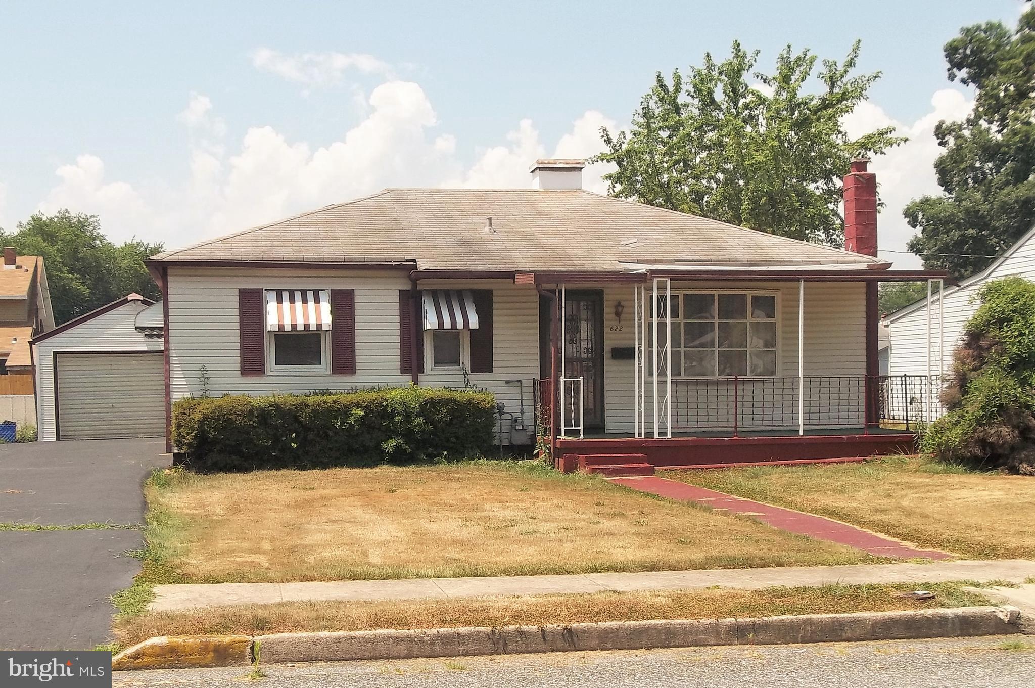NEW PRICE! Detached rancher, 3 bedrooms, 1 full bath, 1 half bath (but could easily be changed to a 2nd full bathroom), separate laundry room, and a one car garage. Off street parking, fenced back yard, alley behind lot too. Furniture can go with the house if buyer wants it. Home needs some TLC. SELLER IS MOTIVATED, COME AND SEE!