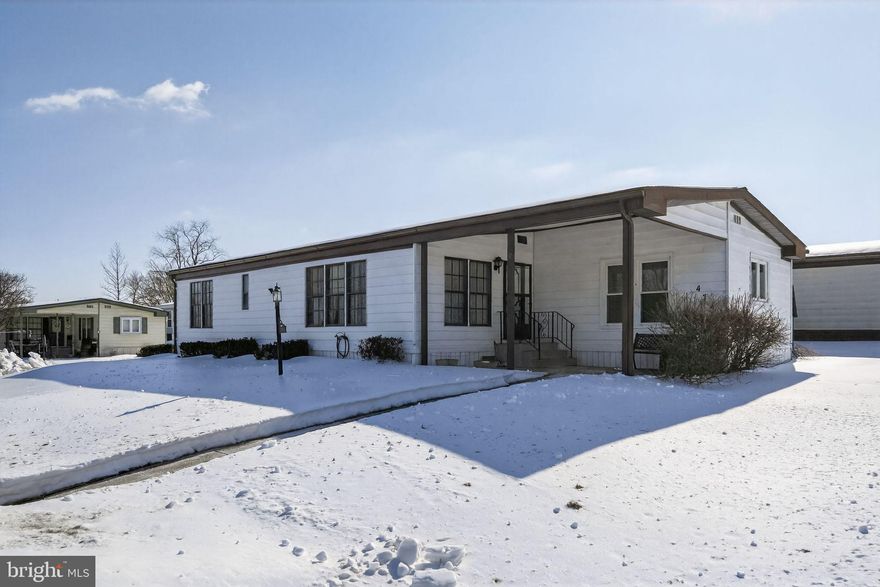 Welcome to this well-appointed double-wide manufactured home in the peaceful Neshaminy Falls community, featuring 2 bedrooms and 2 bathrooms on a desirable corner lot. This single-level residence offers comfortable living with a spacious layout, functional kitchen, primary suite with private bath, and a second full bathroom for guests. The corner lot provides extra outdoor space, added privacy, and enhanced natural light. Located in an active 55+ community, you'll enjoy a vibrant social atmosphere with easy access to local shopping, dining, healthcare, and major routes throughout Bucks County.