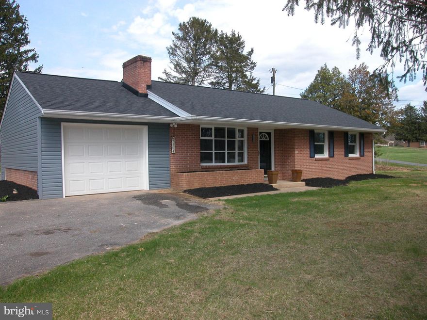 WOW!! Light, bright and spacious 3bed/3bath on TWO corner lots totaling .77 acre. Two finished levels over 2100+ sqft. provides great space for the entire family. Lower level family room, cozy second fireplace, rec room with separate home office or 4th bedroom. Gourmet kitchen stainless steel appliances, new cabinets, ceramic flooring and new paint topped off with quartz counters. Primary bedroom suite hardwoods with separate private luxury bath. Large circular drive, updated roof and Trane HVAC system.  Professionally landscaped, new siding, OVER-sized one car garage including new door/opener. Hard to find great neighborhood on east side of Hancock near I70 makes this home a perfect commuter location.