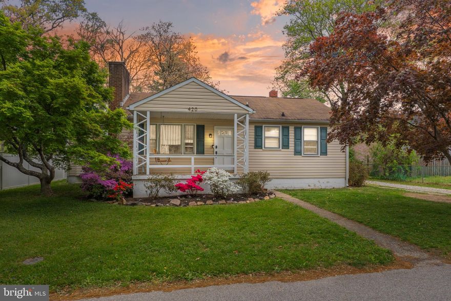 Welcome to 420 Riverdale Road in Severna Park, where every day feels a little lighter. Start your morning on the front porch swing, coffee in hand, before stepping inside to a home filled with natural light and a cozy fireplace that instantly sets the tone. The kitchen steals the show with vaulted ceilings, exposed wood beams, and sunlight pouring in, flowing effortlessly to the back deck through sliding glass doors.

Out back, your own private retreat awaits, with an expansive yard that features an in-ground pool, updated equipment, and a new shed, perfect for relaxing or hosting. Inside on the main level, you’ll find two bedrooms, a beautifully finished bath, and a layout with flexibility to create additional space in the primary if needed. The partially finished lower level offers one room, extra storage, and it even has more potential with plumbing connected. 

Tucked in a sought-after location close to parks, water access, and everything Severna Park is known for, this home blends comfort, character, and opportunity in all the right ways.