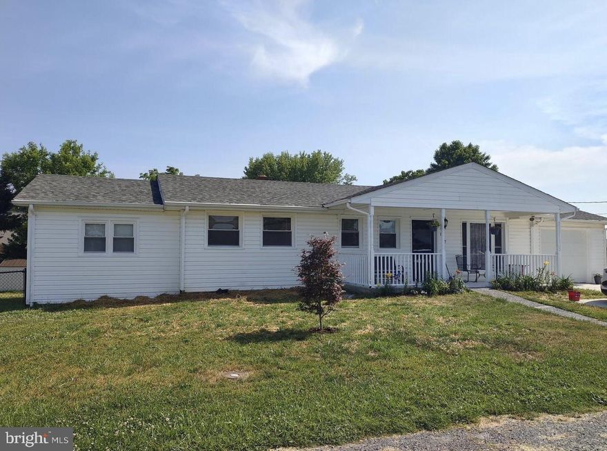 This well-maintained home is full of rustic charm and recent renovations with a spacious basement. Hardwood floors run through the living room and all of the bedrooms. An updated kitchen is the heart of the home, and  features knotty-pine cabinets and an island with butcher block countertops, adding to the farmhouse feel of this home.  Three  secondary  bedrooms share an updated hall bathroom with a fully tiled tub-shower combo. The spacious primary suite features a walk-in closet  and an attached bathroom with newer vanity, quartz countertops, and newer lighting.  All bedroom closets feature custom barn doors. A largen den with fireplace and attached bath offers plenty of additional living space or to be used as another bedroom. It also has a separate entrance, making it the perfect in-law suite! The expansive backyard is fully fenced, a garage, and with two covered porches you will have an abundance of outdoor areas to enjoy the warm summer months. This home is centrally located,  with easy access to I-81 and just minutes from the charming shops and restaurants of Historic Old Town Winchester.
Recent updates include: roof is about 9 years old, furnace about 2 years old. Septic was pumped in 2022 and new D-box installed in July 2011.