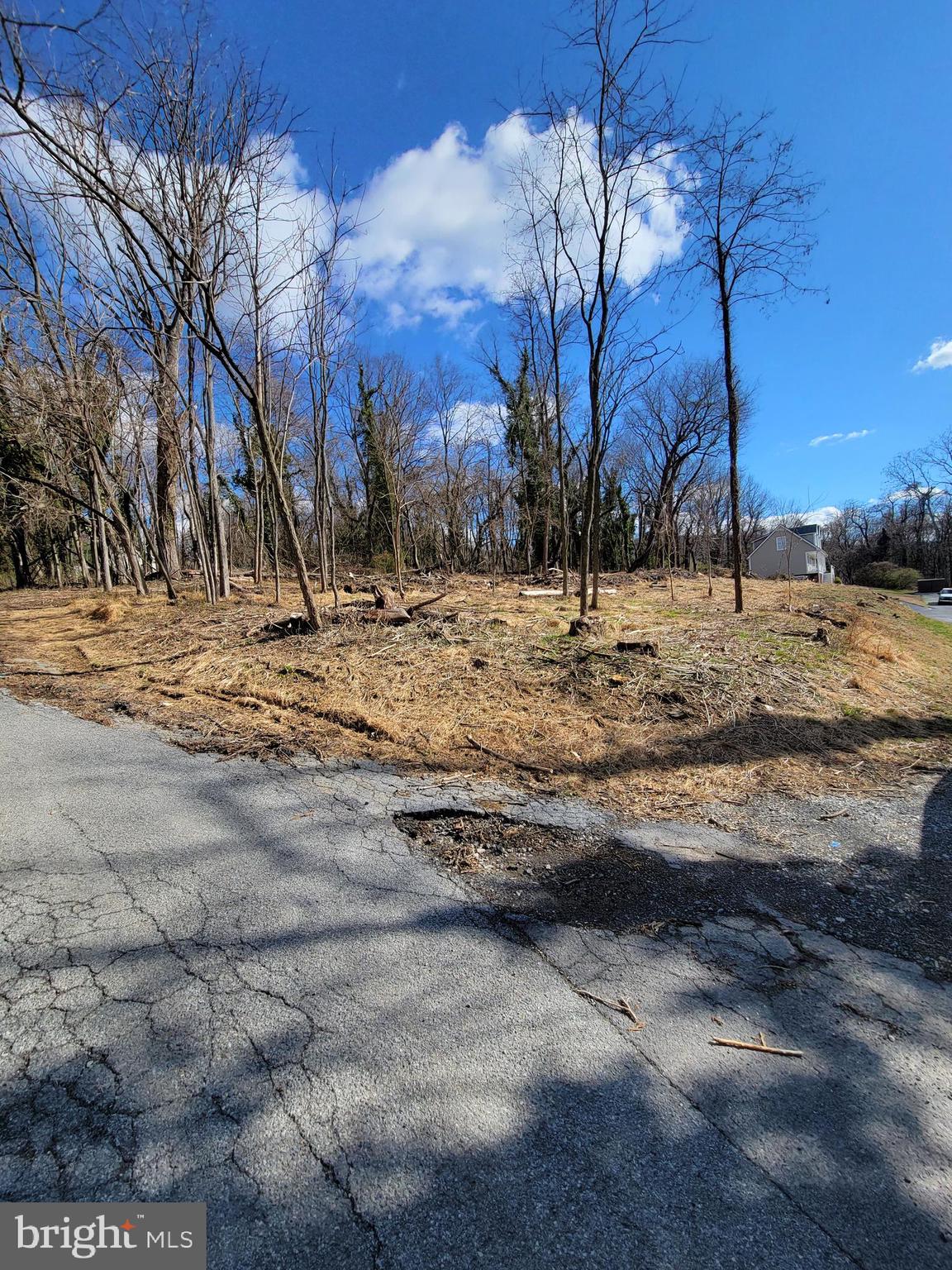 Wow....Great location for this .38 AC lot at the corner of Boundary and Fillmore Streets to build your dream primary home or weekend getaway in Historic Harpers Ferry. With its easy and leisurely access to all of the charming shops , restaurants and historical landmarks that downtown Harpers Ferry has to offer, you will soon have your favorite places to relax, have a great meal or enjoy that morning cup of coffee. You will also be within easy distance to Charles Town Races and Casino, the many vineyards and breweries of Northern Virginia and the well established downtown areas of Frederick, MD and Winchester Va. So much to do in this area and you could have a wonderful location in Harpers Ferry to rest your weary soul at the end of the day. Daily Amtrak service to and from Washington D.C. and beyond. Building lots and opportunities like this don't become available very often in this location. Be a part of the
exciting growth that The Hilltop Hotel renovation project is expected to bring to this area. Please google Hill Top House for more information. Sewer is available on the lot via an easement See drawing of Sewer Profiles in documents. Owner has cleared some of the property and created a possible driveway location.