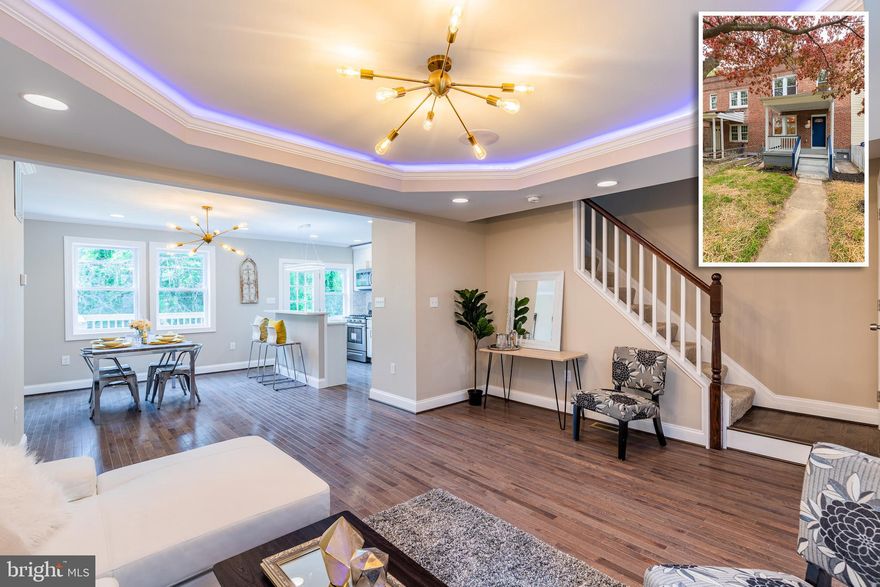 INCREDIBLE CUSTOM RENOVATION WITH DESIGNER FINISHES AND 3 FINISHED LEVELS! Features include an open floor plan w/ hardwood floors throughout the main level, spacious living room w/ tray ceiling and rope lighting, separate dining room w/ crown molding, gourmet island kitchen w/ granite counters, ss appliances, and tile backsplash, upper level w/ 3 bedrooms & 1 full bath, fully finished basement w/ a large family room, 4th bedroom, and full bath, and a rear deck overlooking the backyard!  Pack your bags and move right in!