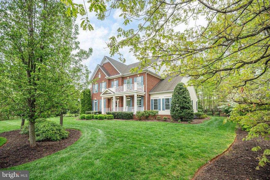 Step into the epitome of luxury living with this exceptional 4-bedroom home nestled in Fredericksburg's most sought-after community, Fawn Lake. As you approach the property, the meticulously landscaped grounds welcome you, setting the stage for the grandeur that awaits within.

Spanning 6,000 square feet, this residence exudes elegance and sophistication at every turn. From the moment you step through the front door, you're enveloped in a sense of tranquility and refinement, as well as meticulously cared for at every turn.

The main level offers stunning, newly refinished hardwood and craftsman style three-piece trim throughout. 
 The separate home office offers privacy with french doors.  The large dining room is perfect for entertaining and features wainscoting, three-piece trim, and elegant pillars.  Entertain guests with ease in the gourmet kitchen, boasting top-of-the-line, stainless appliances: 6-burner gas cooktop with stainless steel range hood, wall oven, built-in microwave/convection oven; french style refrigerator, deep stainless double sink, & dishwasher; and ample granite counter space for culinary creations. There is a built-in home secretary system to keep bills organized and creates the perfect charging station. Additionally, there is a large pantry, countertop bar seating, and light-filled breakfast room.  Adjacent to the kitchen, the main level laundry room with stunning cabinetry & laundry room sink adds convenience to your daily routine.  The main level, 2-story family room features a breathtaking floor to ceiling gas fireplace with a stone mantle, and plenty of natural light from the oversized windows. 

To complete the main level, an exquisite retreat, featuring a primary bedroom complete with a sitting room with french doors to patio, newly updated spa-like ensuite, and a walk-in closet equipped with a custom closet system with cabinetry. The primary ensuite is updated to include an oversized seamless glass shower, heightened vanities with custom surround cabinetry, luxurious heated tile flooring, and separate water closet.  Indulge in the ultimate relaxation as you unwind in your own private sanctuary.

Venture upstairs to discover a haven of comfort and convenience. The bedrooms are generously sized, two with their own walk-in closets, ensuring that everyone in the family has ample space to call their own. A junior master with ensuite & two additional bedrooms connected by a Jack & Jill bathroom offer versatility and privacy for all.

But the true pièce de résistance awaits in the lower level. With over 1,800 square feet of fully finished space, this area is a haven for entertainment and relaxation. Bask in the abundance of natural light as you enjoy the expansive rec room, separate gym, and two additional bedrooms (not to code), perfect for guests or extended family. The full-size bathroom, surround sound, recessed lighting, and ample storage complete this impressive space.

Step outside to your own private oasis, where a paved patio beckons you to unwind by the built-in fire pit, surrounded by a knee wall for seating and added privacy. The fully fenced backyard offers a safe and serene retreat for outdoor enjoyment.

There are many updates and features to include in this well-cared for home to include: Newer siding, both HVACs, heat pump, furnace, new sump pump, radon system, new primary bath, irrigation system, & MORE. (Full listing of updates to be provided)

Located in the amenity-filled Fawn Lake community, you'll have access to a wealth of recreational activities including a lake, tennis and pickleball courts, golf course (with golf course membership), pool, trails, clubhouse, and more. With proximity to shopping, restaurants, and major highway corridors, convenience is at your fingertips.

Don't miss your chance to experience the pinnacle of luxury living in Fredericksburg. Schedule your private tour today and embark on a journey to your dream home.