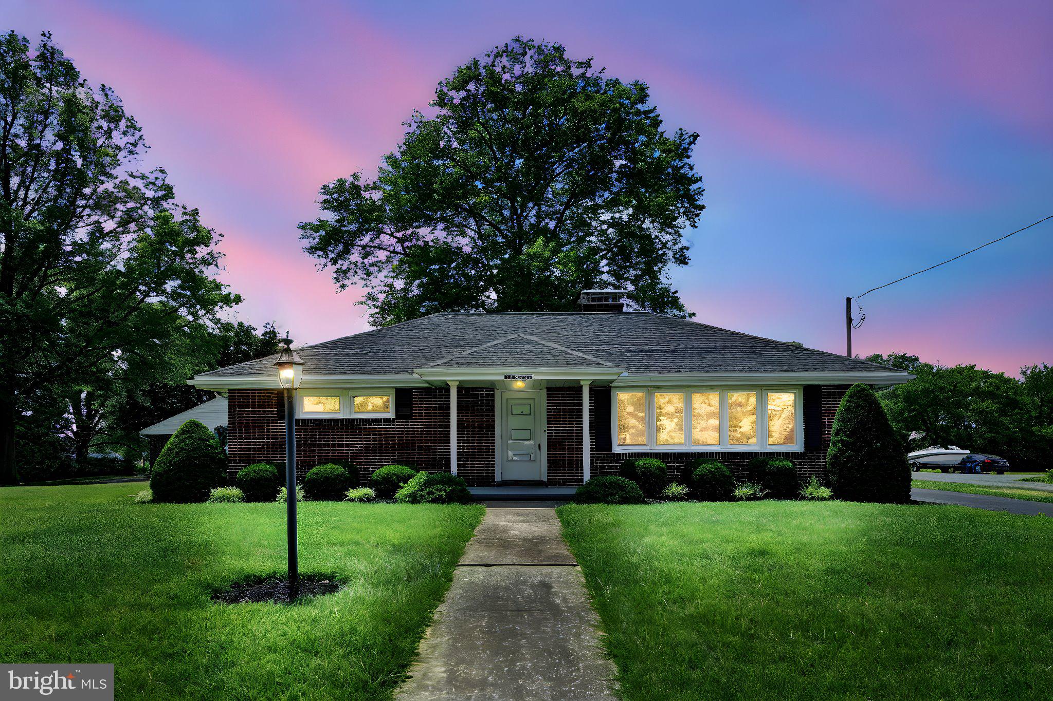 Selling real estate for over 20 years, this is one of the nicest and most immaculate brick homes we ever had the opportunity to offer for sale! This solid brick rancher is on an extra large corner lot totaling 0.43 acres. Property is zoned R2 (medium density residential). The entire property has been recently updated including all new paint and refinished hardwood floors. Property consists of 3 bedrooms, 2 full baths, large living room area, updated kitchen and partially finished basement. The kitchen has a ton of cabinets, ceramic tile backsplash, granite countertops, pantry and stainless steel appliances. The full bath on the main level was also remodeled with new granite top vanity and tile tub/shower. The family room is located in the partially finished basement and has electric baseboard heat along with an additional tub/shower full bath. An oversized detached brick garage is located in the rear, which has it's own heat source! Beside the garage is an attached carport area with secluded back yard space. The large side yard has many possibilities such as the potential to add a pool and/or another detached garage! Replacement windows. Central A/C. 200AMP.