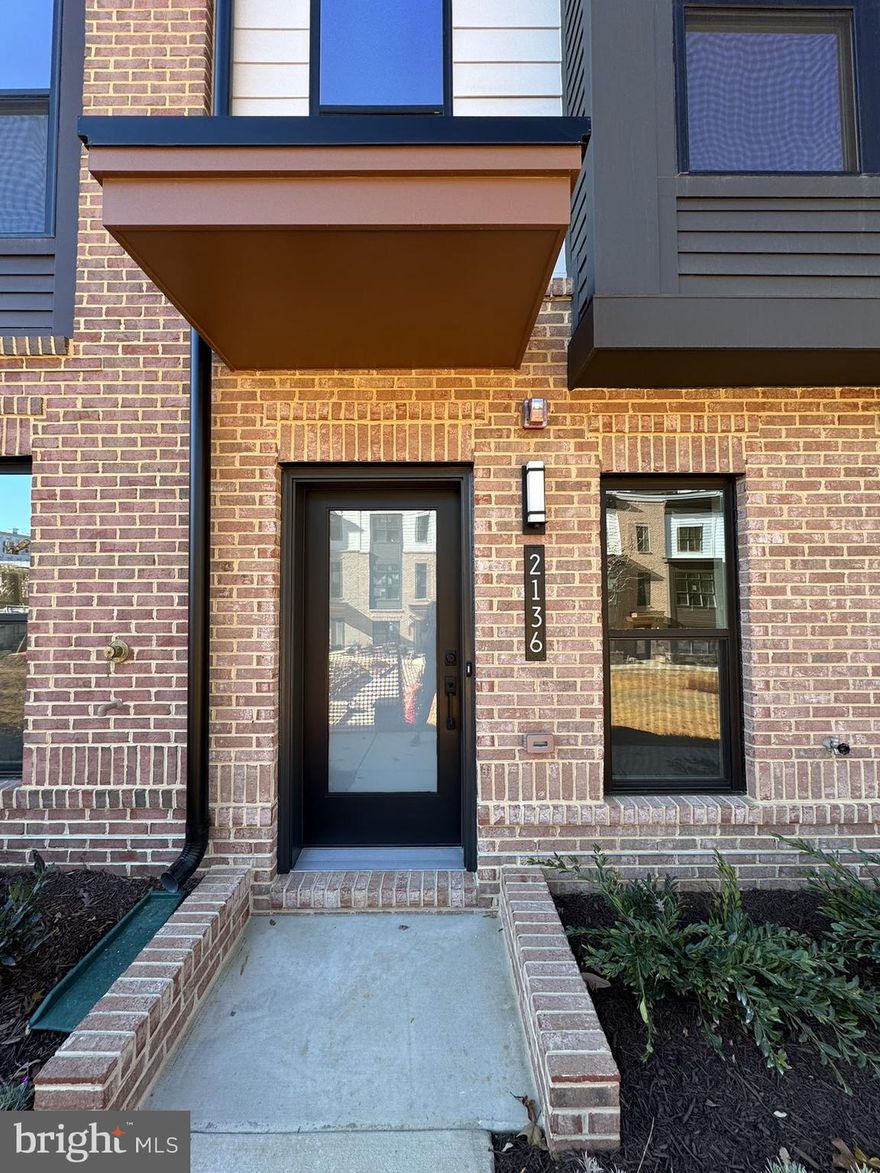 New luxury Townhome in sought-after Tysons Ridge new development,  just minutes from Tyson Corner, Whole Foods, and Trader Joe's and easy access to IAD Airport. 3 bedroom suites. open floor plan. Large kitchen with island, stainless steel appliances, quatz countertops. 2-car garage......quiet community, facing beautiful garden, offering both convenience and tranquility.