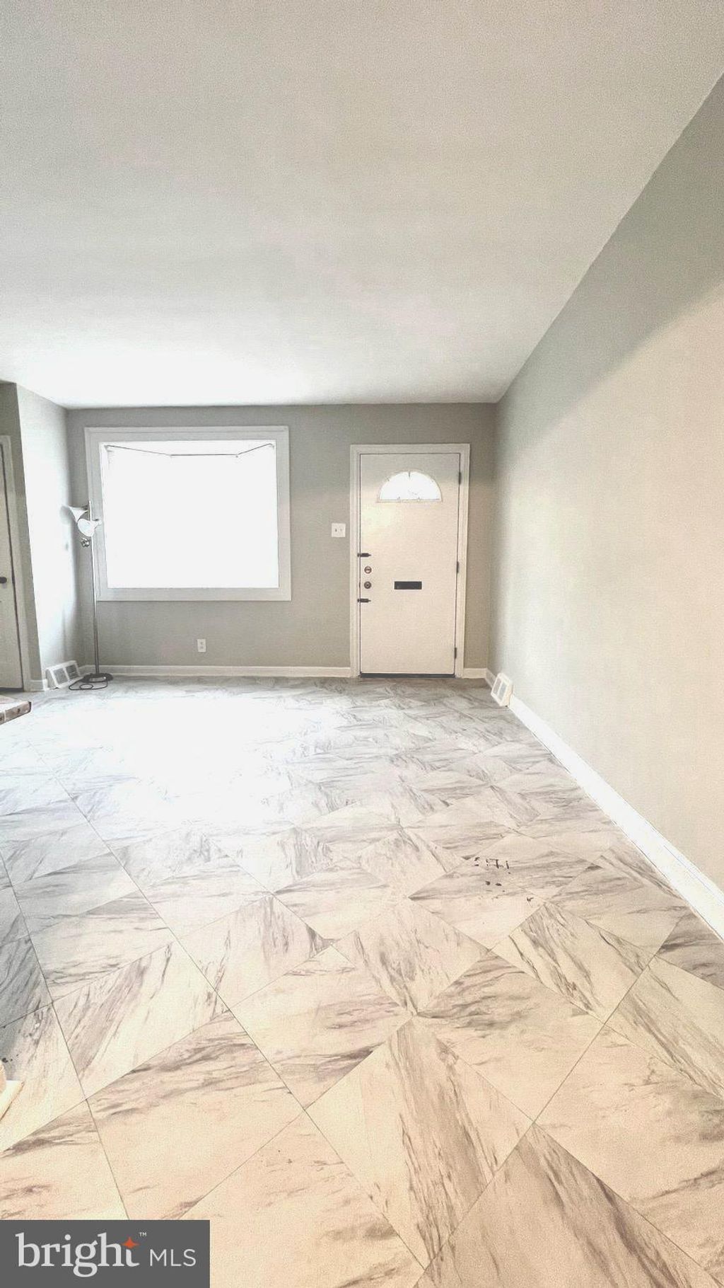 Photo of 648 E Raymond Street, PHILADELPHIA, PA 19120 (MLS # PAPH2572474)