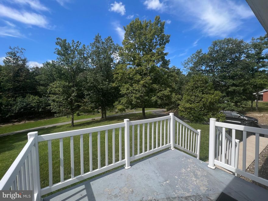 MOVE IN JUST IN TIME TO ENJOY THE HOLIDAYS...BEAUTIFUL SCENERY FROM YOUR FRONT PORCH OR BACK PATIO WITH THIS ADORABLE 3 BEDROOM 2 BATH RANCHER.   VERY WELL MAINTAINED WITH A LARGE LIVING ROOM, DINING AREA AND EAT IN KITCHEN.  MASTER BEDROOM WITH ENSUITE BATHROOM.  FINISHED FAMILY ROOM IN BASEMENT WITH BEAUTIFUL STONE WALL SURROUNDING  FLUE ACCESS FOR A WOOD OR PELLET STONE.   EXTRA ROOM IN BASEMENT  COULD BE A WORKOUT OR OFFICE SPACE.  COUNTRY LIVING AND PRIVACY AT IT'S BEST WITH ONLY A COUPLE MINUTES DRIVE TO SHOPPING AND DINING.  CALL TODAY TO SCHEDULE