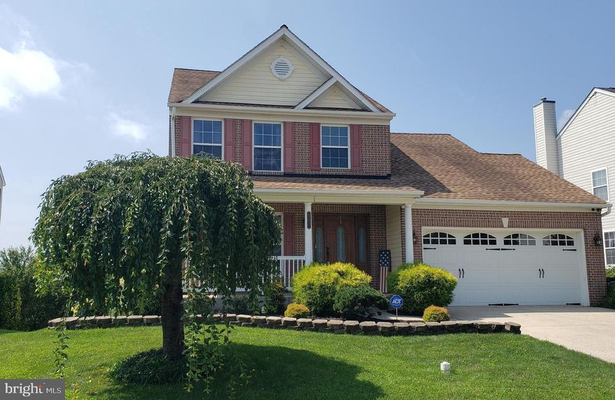 Beacon Point! Beautiful Brick front Colonial w/covered front  porch.  3 Bedroom 2 -1/2 baths.  Newer updates to include: Kitchen w/ceramic tile flooring, all stainless appliances, granite counters, updated baths, trex deck, huge rear fenced yard, new paved patio.  walk-out basement.  Shows well!