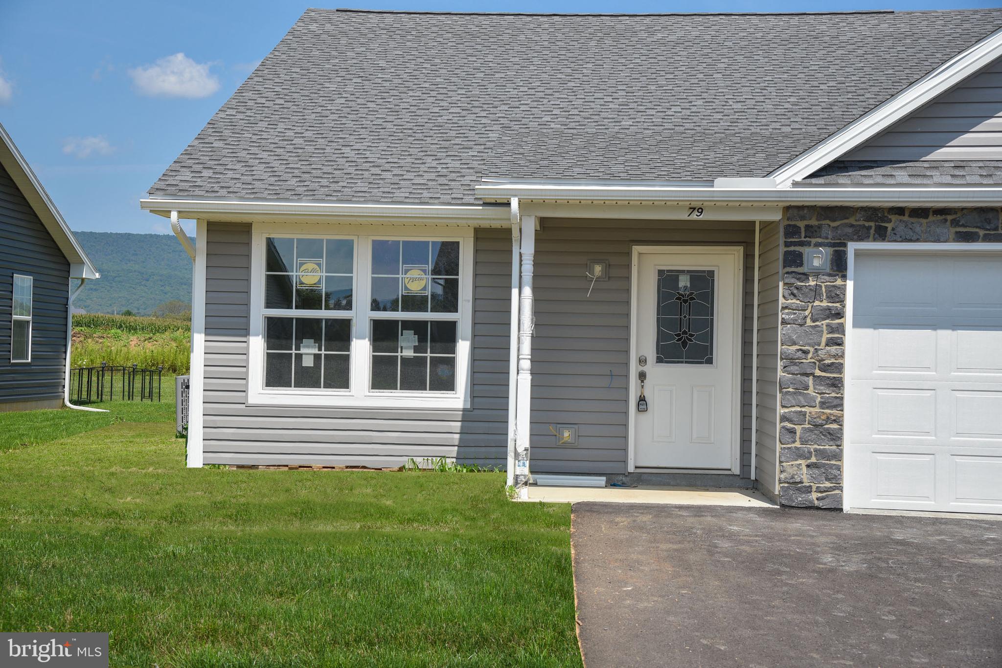Welcome to beautiful Shalamar Gardens! This brand new construction would be awesome with a very short commute to State College or an investment property or for PSU events. Fabulous neutral decorating and fantastic views. The fresh air and beauty of the mountains abounds in this spectacular neighborhood just a short drive to State College. This 1/2 duplex features 3 bedrooms, 2 full baths, laundry, patio and garage all on one-floor living. The spacious kitchen with granite countertop/dining/ great room leads to a nice private rear yard for your enjoyment. Paved driveway is also included. There is a one time $75 fee due at settlement. Don't miss the opportunity to own one of these gems--call for a tour today! Open concept great for entertaining with luxury vinyl tile, stainless steel appliances and granite countertops. Very easy to finance because you own your very own land!