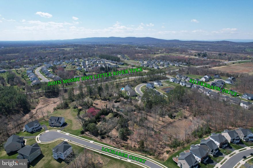 A 7-acre land parcel at 40820 John Mosby Highway, Aldie, VA, surrounded by high-end homes, ideal for developers and investors. Zoned TR1, it is approved for religious use, and residential development. Child and Adult Daycare use are possible via Special Use Permit. Located in a desirable area with dual access from a busy highway and a quiet street, it combines visibility with privacy. The nearby demographic within a 10-minute drive has a median household income of $185,000, and essential amenities like Harris Teeter are just a 7-minute drive away. A unique opportunity in a thriving community.

Water, electric, gas and sewer connections are all on-site
Prime 7-acre land in upscale Aldie, VA, ideal for residential or special use development.
Zoned TR1 for varied opportunities, including homes, religious facilities, and daycare centers (with permit).
Strategic location with dual access from John Mosby Highway and Martina Ct, blending visibility and privacy.
Surrounded by high-end single-family homes, within a 10-minute drive of affluent demographics and essential amenities.