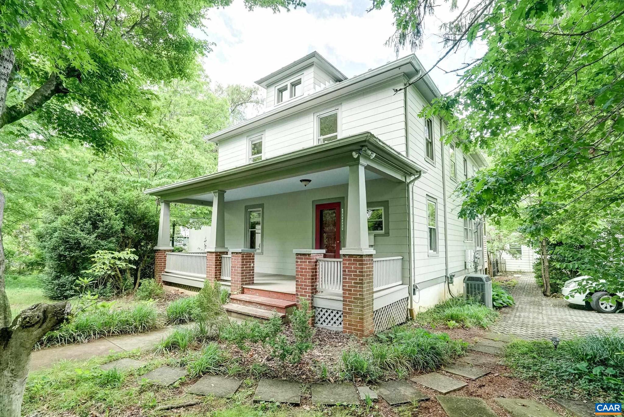 NEW PRICE! Beautiful downtown home with stunning addition (2020), detached, income generating cottage, and detached 2-car garage with studio/office space in the charming Frys Spring neighborhood of Charlottesville. Located on 1+ acre with lush landscaping providing privacy and year-round color, garden space and off street parking! Solar panels provide 100% of electricity depending on the season. This unique custom home features original hardwood floors throughout the main house, with a large living room that opens to the formal dining room. The newly added kitchen features quartz countertops, white cabinets, stainless steel appliances and an eat-in breakfast nook. Main level living with the expansive light-filled primary suite that features a luxurious spa-like bathroom, walk in closet and screened porch access. Upstairs three generously sized bedrooms share a full hall bathroom, and a fourth bedroom could be converted from a built-in closet back to a fifth bedroom if desired. The detached 2-car garage features a ground floor office/workout space, half bathroom and loft area, and the income-generating 2 bedroom cottage features. a kitchenette, full bathroom and living room. This home is a must-see in the heart of town!,Painted Cabinets,Quartz Counter,Wood Cabinets,Fireplace in Living Room
