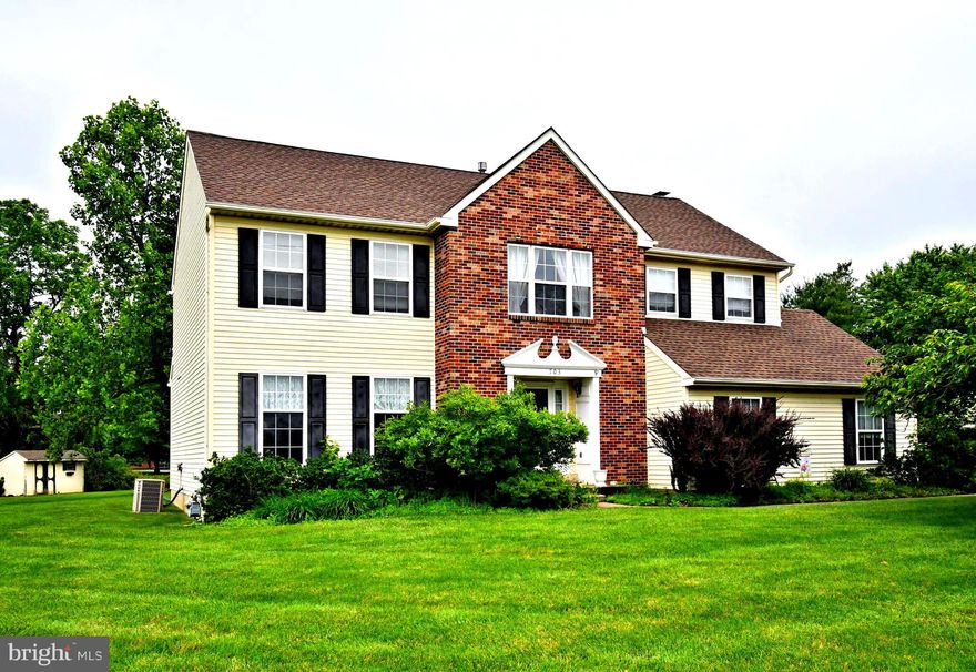 Don't miss out  on this exceptional opportunity in the sought-after Symphony Estates development! This charming 4-bedroom, 2.5-bath Colonial is brimming with potential and perfectly positioned on a beautifully landscaped, fully fenced over half-acre lot. The spacious kitchen offers ample counter space , wood floors  and flows seamlessly into a generous family room featuring a classic brick wood-burning fireplace and sliding doors that open to a deck overlooking the serene backyard — perfect for relaxing or entertaining.  Upstairs you will find  four generously sized bedrooms, including a large primary suite offering everyday comfort and functionality, complete with sitting room and featuring a private bath and a spacious walk-in closet with plenty of room for organization.  In addition, this home offers a full basement for added storage and a 2 car side entry garage! Conveniently located near parks, top-rated schools, and a variety of shopping destinations, this home offers the perfect blend of comfort and accessibility.  Newer roof and garage doors.