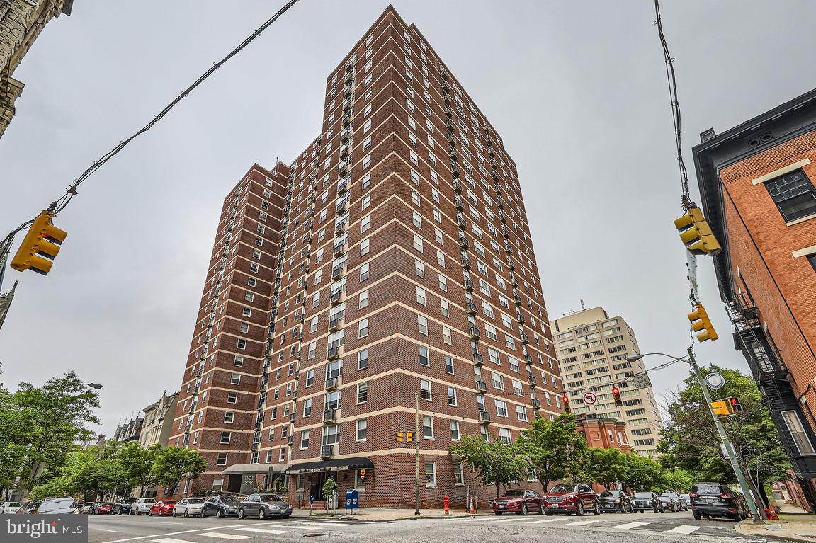 Opportunity to own upper level large two-bedroom unit with brand new gleaming hardwood floors throughout. NO CARPET! In-unit Bosch stackable ventless laundry, stainless appliances, granite counters. Updated bathrooms and fantastic Eastern views. See the outer harbor and whats left of the key bridge from this unit! Full-service secure elevator building with 24-hour desk and parking attendant in underground garage. Parking fee is rented at an additional monthly fee. On-site deli and convenience store delivers directly to units in the building. Management agent on site. Historic Mount Vernon location in the arts and cultural district of Mid-town. Convenient shopping, entertainment, dining and night life options are abundant. Never lived in since renovations completed in 2025. Brand new central air conditioning. This unit is not to be missed!