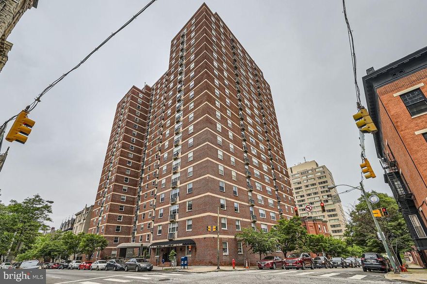 Opportunity to own upper level large two-bedroom unit with brand new gleaming hardwood floors throughout.  NO CARPET!  In-unit Bosch stackable ventless laundry, stainless appliances, granite counters.  Updated bathrooms and fantastic Eastern views.  See the outer harbor and whats left of the key bridge from this unit! Full-service secure elevator building with 24-hour desk and parking attendant in underground garage.  Parking fee is rented at an additional monthly fee.  On-site deli and convenience store delivers directly to units in the building.  Management agent on site.  Historic Mount Vernon location in the arts and cultural district of Mid-town.  Convenient shopping, entertainment, dining and night life options are abundant.   Never lived in since renovations completed in 2025.  Brand new  central air conditioning.  This unit is not to be missed!