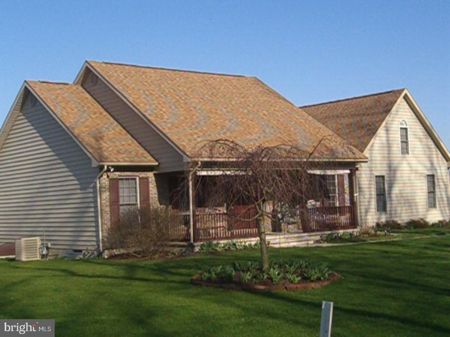 An open floor plan is paired with covered porches in this classic four bedroom home. The cathedral ceiling adds volume to the great room. The extra large master suite is located for privacy and includes a well-appointed bath with jacuzzi tub, separate shower, and dual vanities. The extra large full basement features a pellet stove which supplements the efficient oil heat. The attached oversized two-car garage features 9' high garage doors, a real plus. Also, a detached one-car garage can be used to store another vehicle or lawn equipment.  The above ground pool is perfect for summer cooling. Mailing Address Continued: Schuylkill Haven Color: Beige Amp: 200