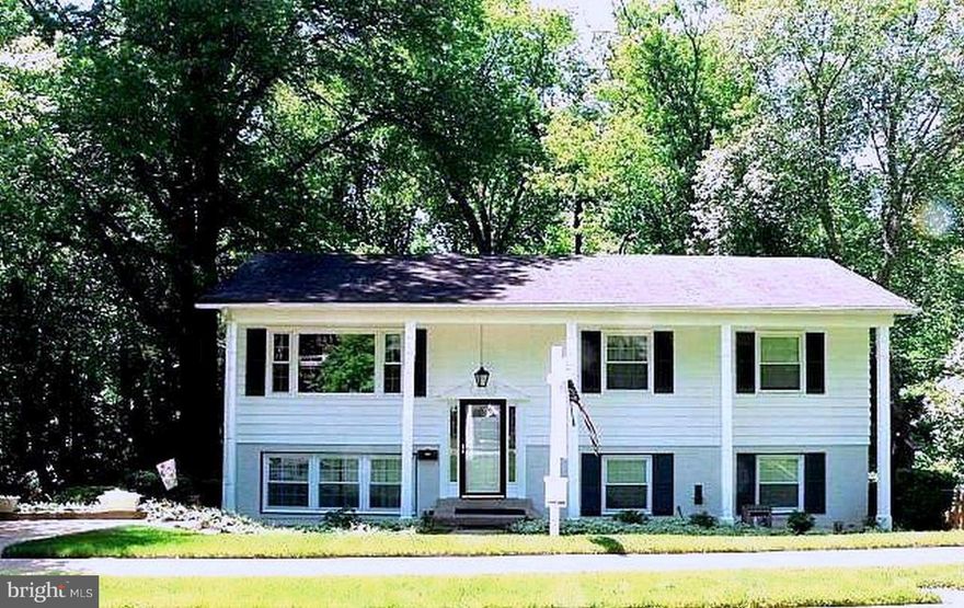 Renovated and meticulously maintained, this home backs to a wooded paradise for privacy/great view from patio/deck/screened porch. Fenced yard, landscaping, new windows and paint. Beautiful hardwood floors, 5 good sized bedrooms, 7 ceiling fans! Woodson district. Close to 495, playground, park, shopping and NOVA. Ask about items that may convey. Don't miss this pristine home! Give 1 hr notice pls.