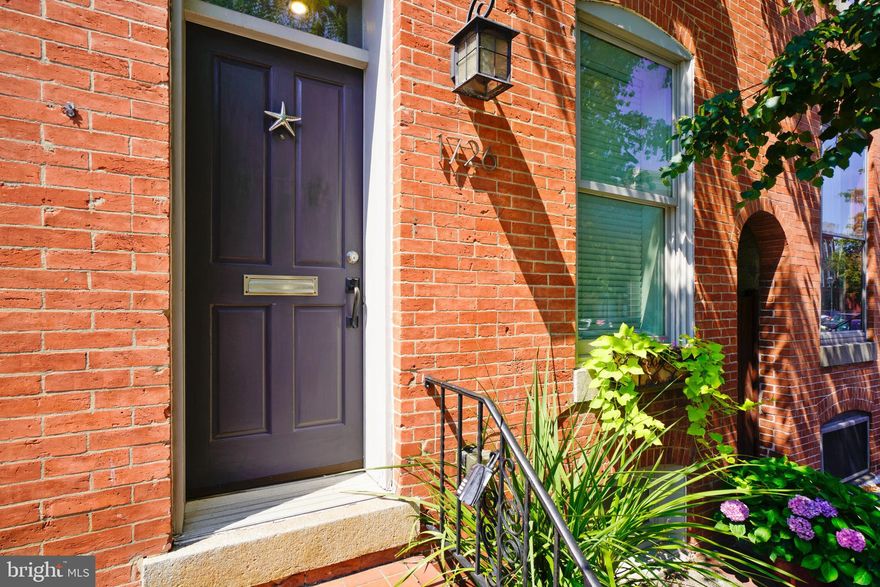 Where else will you find a fully renovated 3BR/3BA home WITH GARAGE PARKING only a block for Broadway market?! This has to be downtown's best buy right now! Just a few blocks to the harbor, Thames Street and adjacent waterfront neighborhoods. After shopping at the new 47,000 square foot Whole Foods, bring your groceries home to prepare a meal in the large galley kitchen with imported Italian Scavolini cabinetry. (Don't feel like cooking? There are dozens of restaurants of all types just outside your door!). Enjoy your morning latte on the deck off the kitchen/dining area. Tall ceilings (10' on the main level and 9' on others) make the space feel even larger. Flexible use first floor (would be a great family room). Three bedrooms and three full baths. Master bath with jetted soaking tub and separate shower. Built-in cabinetry and other storage throughout the house. Large living room (can be 4th bedroom if needed) with two oversized skylights. Zoned heating and cooling with high efficiency gas furnace for lower floors and heat pump for upper floor. Updates include water heater (2020) and both AC units. (NOTE: Wall and door between living room and hallway was added by previous owner and could be removed to make that space more open).