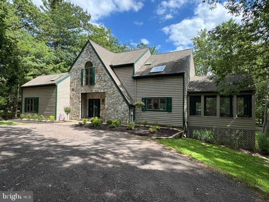 Welcome to 1038 S Blakeslee Road! A spacious lakefront retreat on Deep Creek Lake offering effortless lakeside living.  A Rare opportunity to own in one of Deep Creek’s most sought-after lakeside communities. This five-bedroom, five-bath home sits on a large 1.11-acre level lot with easy access to the water and generous outdoor space for recreation and entertaining. Inside, the home is warm and inviting with abundant natural light, beautiful hardwood floors, and stone fireplaces. The flexible floorplan provides multiple gathering spaces including the main floor living room and dining area opening to a screened porch and an expansive deck, seamless indoor/outdoor living within a serene lakeside setting. Practical details and timeless finishes combine for a relaxed yet refined lake-house feel. Enjoy exceptional community amenities including a large clubhouse with an indoor pool, pickleball and basketball courts, a soccer field and playground.  Do not miss this extraordinary chance to own this beautiful home in the Blakeslee!  Call today to schedule your private tour.