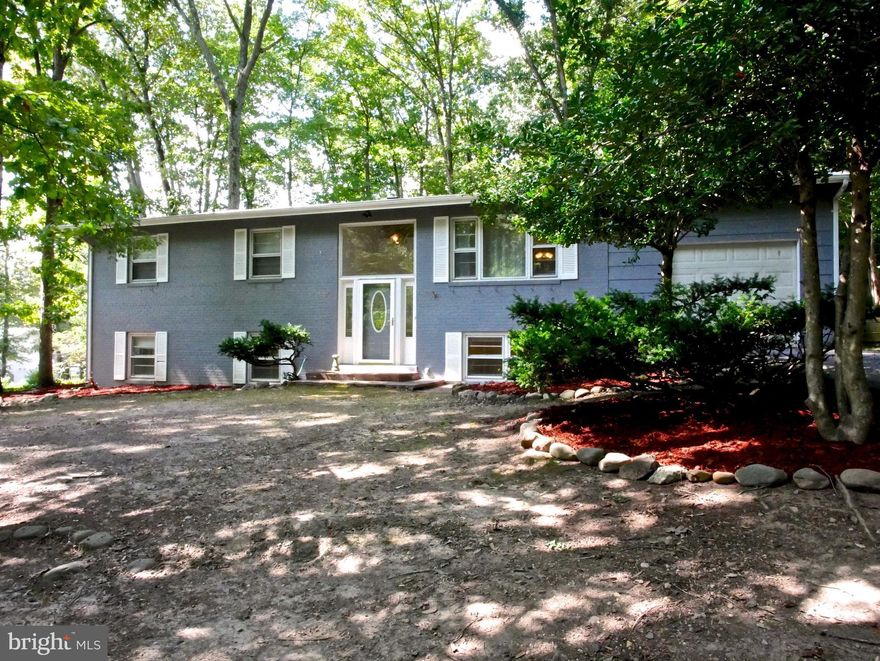 Premium location in the heart of Springfield! Amazing private lot with deck & patio, perfect for entertaining or just relaxing. Spacious & open living area. Windows throughout home bring in tons of natural light. Hardwoods on main level and ceramic tiles in lower level. 2 Fireplaces, separate side entrance. Great location with, 495, 395, 95, Metro, Springfield Mall & much more await you.