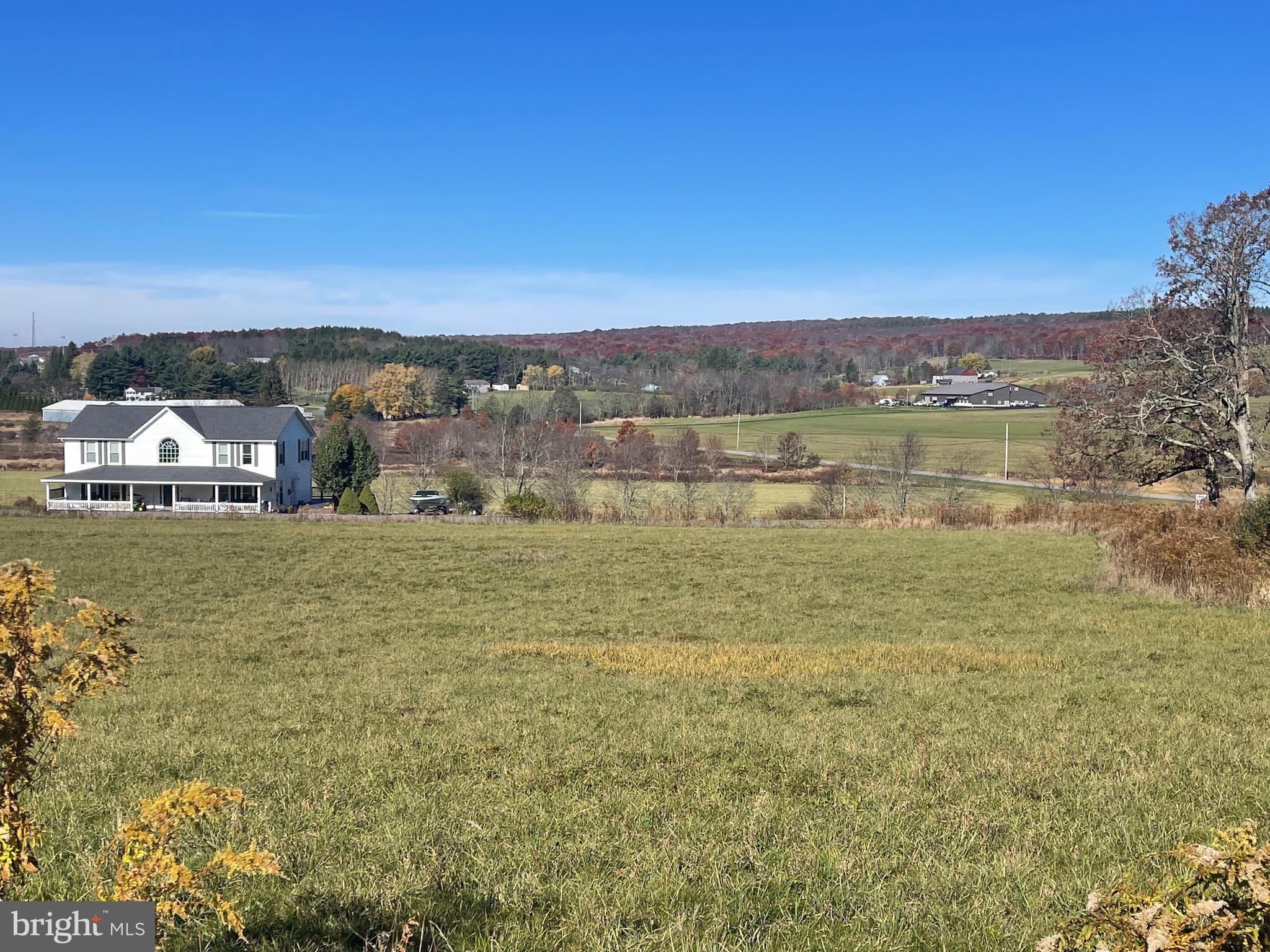 Lot 18 in Wispering Views community give you scenic views of the McHenry valley and the Wisp Ski Resort and western facing sunsets. Location is just minutes to Deep Creek Lake, the Ski Resort, the Aquatic Recreational complex and all the Dining and shopping stores in McHenry. Large 1.11 acre lot for you to build your Dream home or vacation cabin. Small HOA fees to remove snow and maintain the paved roads. Take a drive and check out the views for yourself.