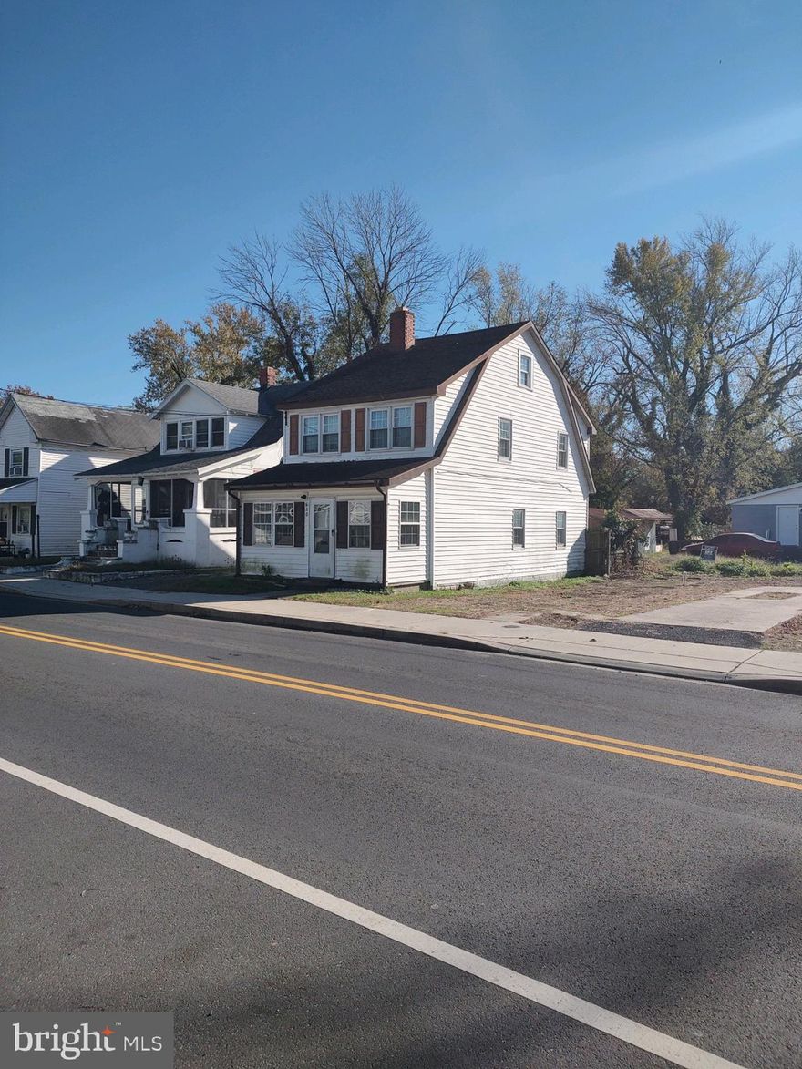 2 unit home on Washington St. is a great way to start your investment career, add to your portfolio, or even gives a buyer the opportunity to live in one unit and rent the other. Home features an enclosed porch housing separate entrances to each unit- a great place for a tenant to store a bike or scooter too! The 1st floor unit is currently a blank slate to finish off as you desire- lending itself to a 1 bedroom, 1 bath layout. The fireplace is non-functioning. Electric baseboard heat & window a/c. The upstairs unit is a 2 bed, 1 bath layout- ductless mini split HVAC, and electric baseboard backup. Both units are currently vacant. The downstairs unit previously rented for $750/mo., and the upstairs was rented for $850/mo. ($1600/mo. total). 2 electric meters in place. driveway to the left of the front door offers at least 1 off-street space to a tenant or owner. Priced to sell!