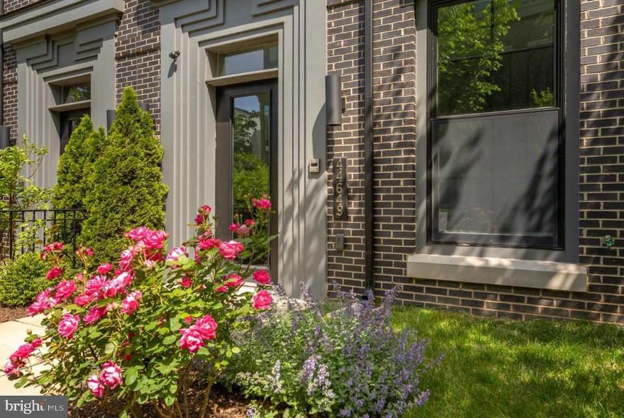 Luxury One Loudoun townhome by Miller & Smith. With modern design and high-end finishes, this four-story, elevator townhome (4,300+ sq/ft) in One Loudoun provides all the luxuries you could ask for in the heart of an expanding urban development in Loudoun County. The main living level offers an unparalleled open concept with soaring ceilings and bright windows illuminating the level from front to back. The kitchen is appointed with high-end cabinets, quartz countertops & backsplash, 6-person seated island, and Subzero/Wolf appliance suite. The expansive island commands attention with so much room for entertaining and dining. The living room features huge windows and modern linear fireplace. Retreat to the owner’s suite with huge walk in closet and owner’s bath. Laundry room is conveniently located in between all three bedrooms on the third floor! The fourth floor is the place to be! A large rec room greets you while looking out onto the large rooftop terrace. An additional bedroom and full bath is just off the 4th floor rec room. The entry level is a great flex space for a home office or formal living room. Fantastic open space - 10 ft ceilings on 3 levels and 9 ft ceiling on the terrace level. Home features Anderson Black Framed Windows, smart garage door and Two High Efficiency HVAC systems.  The location is excellent! Downtown One Loudoun features an abundance of urban shops, upscale restaurants, and local events. only 15 minutes to Dulles International Airport, 3.5 miles to the Loudoun County Silver Line. Don’t miss out! *Owner is the listing agent.*