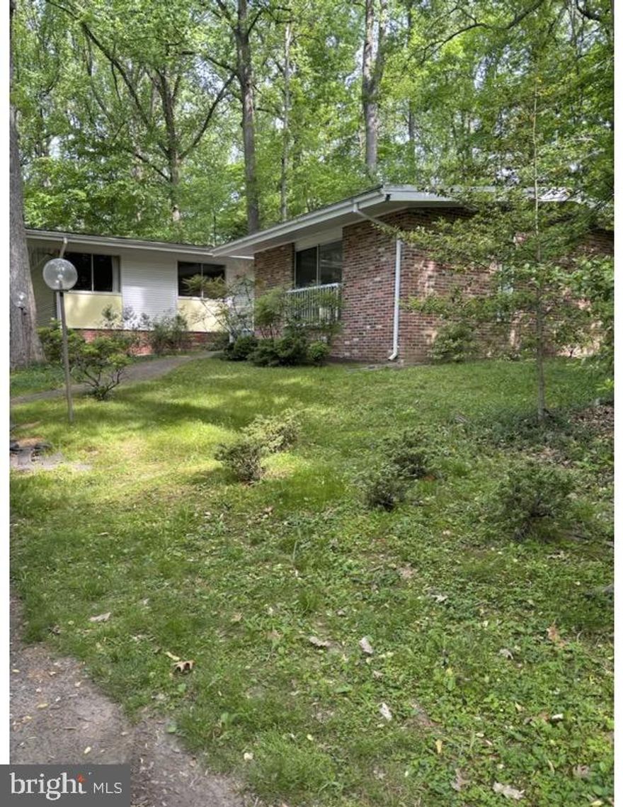 RARE OPPORTUNITY!  4 BEDROOM, 2.5 BATH RAMBLER/MID CENTURY MODERN. SET BACK ON 1 ACRE  LEVEL, WOODED LOT. LOVELY WILLIAMSBURG ESTATES NEIGHBORHOOD.  SERENE SETTING! CLOSE PROXIMITY AND WALK TO POTOMAC VILLAGE, AVENEL PARK, HERITAGE FARM PARK,  SHOPS, RESTAURANTS, TENNIS COURTS. SCREENED IN PORCH,  OFF THE SPACIOUS,  TABLE SPACE KITCHEN. 2 MASTER BEDROOMS,  ONE IN THE ADDITION WITH ENSUITE & WALK IN CLOSET.  FULL UNFINISHED BASEMENT WITH EGRESS.
SOLD IN AS IS CONDITION
COMMUNITY TITLE NETWORK - SETTLEMENT 
OPEN SATURDAY 5/19/24 NOON-3 PM
