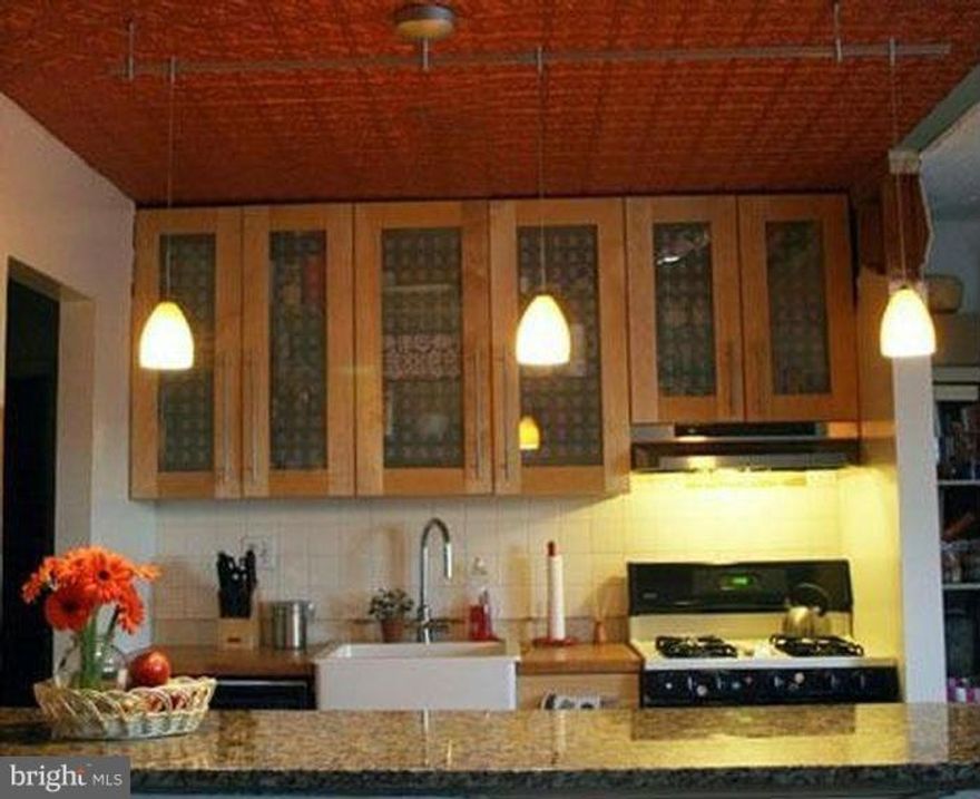 Updated Condo in Convenient Location! Check out this 1 bed 1 bath condo with hardwood floors, renovated kitchen, granite, SS appliances. Pool and Rec Courts included. All utilities included (heat, stove, water) except electricity. Storage unit incl. Close drive to 695 and 83, near public trans, near Falls Rd Light Rail, grocery and organic market. Nearby trail at Lake Roland. W&D in Building.