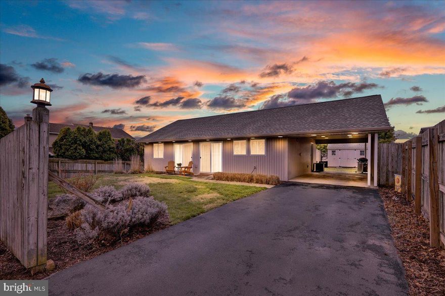 Welcome to 4002 Merrybells Ave, a charming ranch home nestled on a quiet street in Muhlenberg Township. Meticulously maintained and move-in ready, this home offers the perfect combination of comfort and convenience. Designed for one-floor living, this home offers a private, low-maintenance oasis, perfect for affordable, easy living. The beautiful eat-in kitchen features white cabinetry, sleek granite countertops, and stainless steel appliances. Throughout the home, you'll enjoy dimmable LED recessed lighting that creates the perfect ambiance, while an abundance of natural light fills each room during the day. Bonus features include gas heating, a new roof (installed in 2019), a new hot water heater (2023), two sheds, extra storage above the carport with pull-down steps, a reverse osmosis drinking water system, and a water conditioning system. Step outside to enjoy a cup of coffee on one of three private patios, accessible through sliding glass doors from the living room or either bedroom. The master bedroom offers a stylish built-in headboard and blackout shades for your ultimate comfort. This is the home you've been waiting for—call today to schedule your private tour!