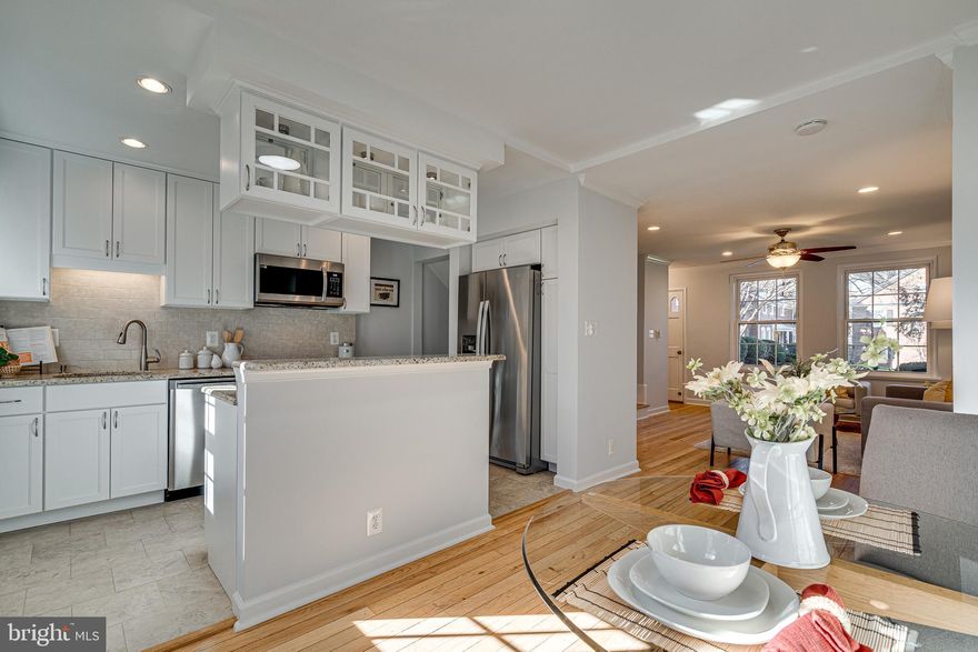 Stunning Move-In Ready "Clarendon Model". Feels Like a Single-Family Home and the Sense of a Much Larger Space w/ The Transformed "Island Kitchen" with Custom White Glass Cabinetry, Stainless Steel Appliances and Granite Counters That Everyone Wants in Fairlington! Stunning Main Level Living and Dining Rooms w/ Recessed Lighting Everywhere, Pristine Solid Oak Hardwood Flooring and Crown Molding. Steps to Your Uniquely Large Private Fenced In Patio in County Club Setting, Open Your Gate To Pool, Tennis & Tot Lot. The Fabulous Patio is Perfect for Entertaining, Grilling or Just Relaxing. The Home is Surrounded by Beautiful Lush Open Greenspaces in The Front and Rear........Back Inside and Travel Upstairs to 2-Full Bedrooms, Large 2nd BR which Allows Larger or Growing Families the Space They Need. Extremely Large Primary BR w/ Double Door Walk-In Closet, 2nd Closet and Ceiling Fan. Pristine Solid Oak Hardwood Flooring on Entire Bedroom Level. Conveniently Located and Renovated Full Bath w/ Pocket Door, Quality and Elegant Materials Just Steps from both BR's. This 4 Level Townhome Has an Extremely Large Attic Excellent For Ample Storage and Even Conversion Potential to 4th Finished Level. A Perfect Future Bedroom Suite, More Living and or Office Space, Even a Possible 3rd Full-Bath Can Be Accomplished. Many Fairlington Owners Have Converted Attics To Living Space.....One Gorgeous 4th Lvl Attic Renovation is Just a Few Doors Down which Has 2 Sky-Lights In The Roof.............Travel Downstairs to the Fully Finished Basement/Second Living Space w/ Many Dual Uses. A Very Bright and Cheery Space w/ Brand New Carpeting, Recessed Lighting, and Windows Wells w/ Natural Light. The Perfect Family Room Combined w/ An Office, Playroom or Many Other Dual-Uses Due to Its Large Size! The Back Den Is Perfectly Used For a 3rd Bedroom/Office, or Other Uses as Well, All Leading to the Amazing Renovated En Suite Full Bath Everyone Will Love. This Extremely Desirable and Inviting Lower-Level Bonus Space Is Sure to Be Enjoyed By All. This Regal Home Boasts a Large Amount of Storage Options, which is Not Typical in Other Fairlington Townhomes. The Entire Home Just Painted In Modern Move-In Chic Paint Colors. Energy-Efficient Windows w/ Window Treatments. Highly Rated HVAC and HWH. Pull Down Stairs to Massive Floored Attic for Ample Storage. Rare Assigned Parking Space Number 445, Pool, Tennis Courts and Tot Lots for Your Pleasure. A Commuters Dream Just Minutes to The Pentagon, Downtown DC. or Try One of The NON-STOP Express Busses for Rapid Convivence! The Incredible Green Spaces and Abundance Of Park Like Settings Are Just One of The Reasons So Many People Are Drawn to This Incredible Historically Designated Community. There Are Four Major Shopping Areas All Within Walking Distance, This Gives Residents the Ability to Park Their Cars and Walk Everywhere! One of Those Areas is Shirlington Village Offering Shops, Huge Variety of Restaurants, Harris Teeter Grocery Store, 2 Fitness Gym's, Library, Movie Theatre, Signature Theatre and more. This Community Has a Plethora of Walking Trails, (If You Like, Walk or Bike out your Front Door Past Dulles Airport on WOD) 2 Neighborhood Dog Parks and An Unmatched Friendliness That Is Contagious and Refreshing. We Hope to See You Soon, Visiting This Wonderful Place to Live!