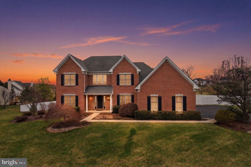 Welcome to this stunning single-family home nestled on over a half-acre of private, beautifully landscaped grounds in the sought-after Hilltown Township neighborhood. This home is located within the highly desirable Pennridge School District. Offering nearly 3,400 square feet of living space, this 4-bedroom, 2.5-bath home combines timeless elegance with modern updates in the serene setting of Bucks County.

From the moment you arrive, the charming brick front, covered front porch, and exceptional curb appeal set the tone. Step inside to a grand two-story foyer with a cathedral ceiling, creating an impressive and welcoming entryway. The main level features hardwood flooring throughout the foyer and kitchen, a private home office space, convenient first-floor laundry, and a spacious family room that flows seamlessly into the kitchen.

The bright kitchen is filled with natural light and offers a cozy breakfast nook with sliding doors leading to a paver patio - just perfect for indoor-outdoor living and entertaining. The fully fenced backyard provides both privacy and space to enjoy the peaceful surroundings.

Completing the main floor you will find a formal dining room, newly renovated powder room, a second staircase to the second floor, and access to your attached garage. 

Upstairs ecompasses four generously sized bedrooms, including a beautifully updated primary suite, along with a fully remodeled hall bathroom. The upstairs boasts expansive natural light, fresh paint and ample closet space. 

The expansive basement with high ceilings offers endless potential! The space is ready to be finished to suit your needs or enjoyed as-is for additional storage and recreation space.

Ideally located just minutes from Doylestown, Route 309, and a variety of shops and restaurants, this home offers the perfect balance of convenience and the scenic charm Bucks County is known for. Other upgrades include plantation shutters throughout the main living space and bedrooms, full bathroom remodels, new driveway, newer water heater and heating system. This home has everything you are seeking plus so much more - schedule your tour today. Do not miss the opportunity to make this exceptional property your own!