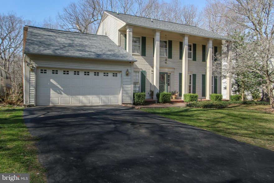 Amazing Updated SFH on prime 1.5+ acre lot! Main lvl sep liv/din rm w/ hdwd leads 2 updated kit w/ granite, break bar, tile flrs, & more off lg fam rm w/ hdwd & wood fp. Access 2 lg deck, gazebo, & pool w/ wooded privacy! Upper lvl 4BR 2BA & new carpet. MA BA updated! Lower lvl den/5th BR, vast multi purpose rec rm, storage, & walk out. New roof & well pump. Newer HVAC & pool replaster/tiles.