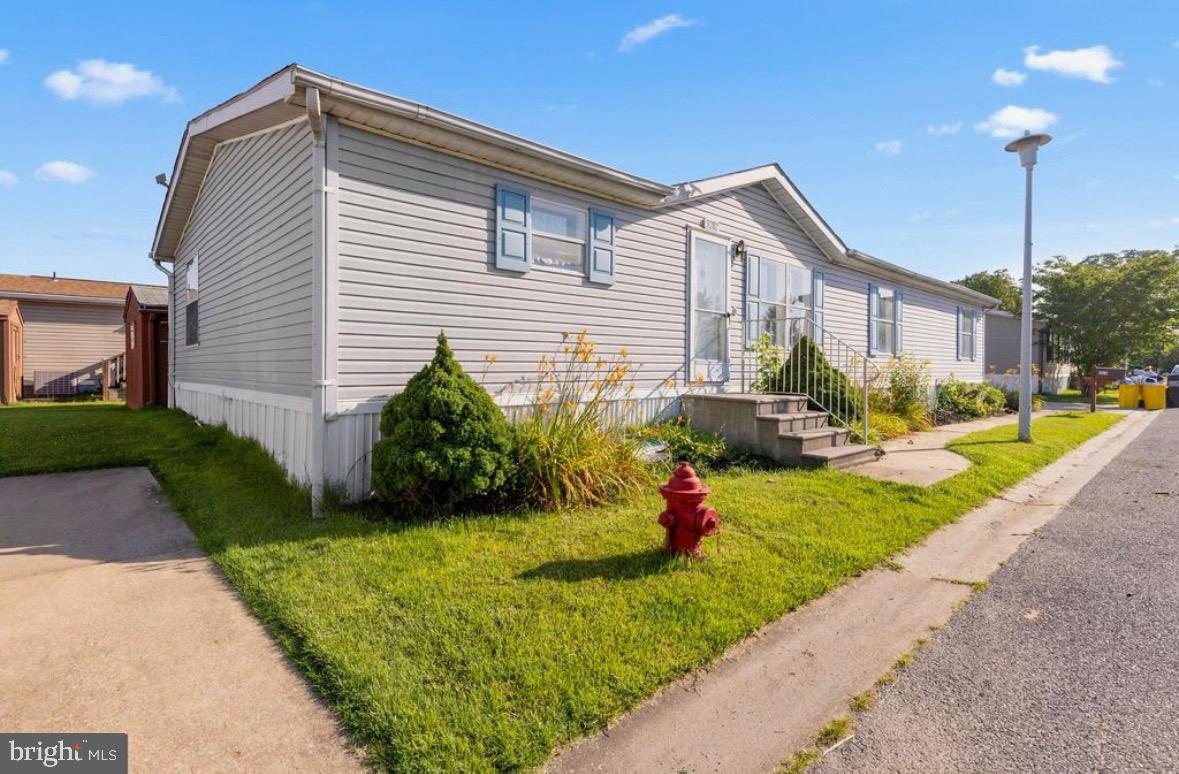 This renovated 3-bedroom, 2-bath home is located in the desirable Williams Estates community. The property is one of the largest in the neighborhood and this spacious home offers an open floor plan and many updates including a new roof. Enjoy the open layout with features of a stylish kitchen, updated bathrooms, and spacious living and dining areas. The large main bedroom includes a private bath and plenty of closet space. There are 2 other additional rooms along with another full bath. Outside there is a large covered rear deck for peaceful enjoyment and a side porch. No lack of storage with the shed in the rear yard. This property is move-in ready and requires park approval. Located close to many amenities for all living needs. SELLER IS MOTIVATED!!!!
