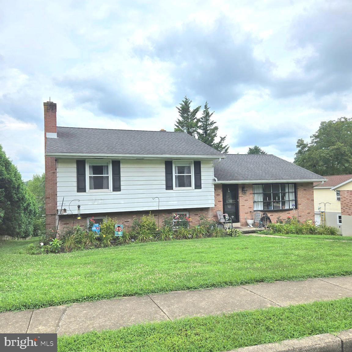 **Back on the market after 5 months, as part of the estate process** New Paint in Basement! No flood insurance needed for this property. Flood Zone X. ** Take advantage of this renewed opportunity to own 24 Craig Drive! Located in the highly coveted Exeter School District, this large 2200+ sqft, 3-bedroom home with 2.5 baths offers a unique opportunity to create your dream space. With hardwood floors gracing the bedrooms and main living areas, this home provides a timeless canvas for your personal touches and updates. A stunning bay window fills the living room with natural light, adding warmth and charm to the space. Situated on a spacious lot, the property features a large driveway, a 1-car garage, and a delightful patio overlooking the serene backyard—perfect for relaxing or entertaining. Mature trees ensure privacy, while a well-kept shed offers convenient extra storage. The NEWLY painted finished basement boasts a cozy wood-burning fireplace, perfect for gatherings or extra living space. A laundry area, half bath (with the potential to convert to a full bath), and utility room complete the basement, making it an ideal setup for extended stays or additional functionality. With solid bones and newer windows already in place, this home is ready for a new owner to bring their vision to life. Unlock the potential to build instant equity in the sought-after Crestwood neighborhood. Don’t miss this fantastic opportunity and the estate is giving 1 year Home Warranty for added piece of mind. Schedule your showing today and start imagining the possibilities at 24 Craig Drive.