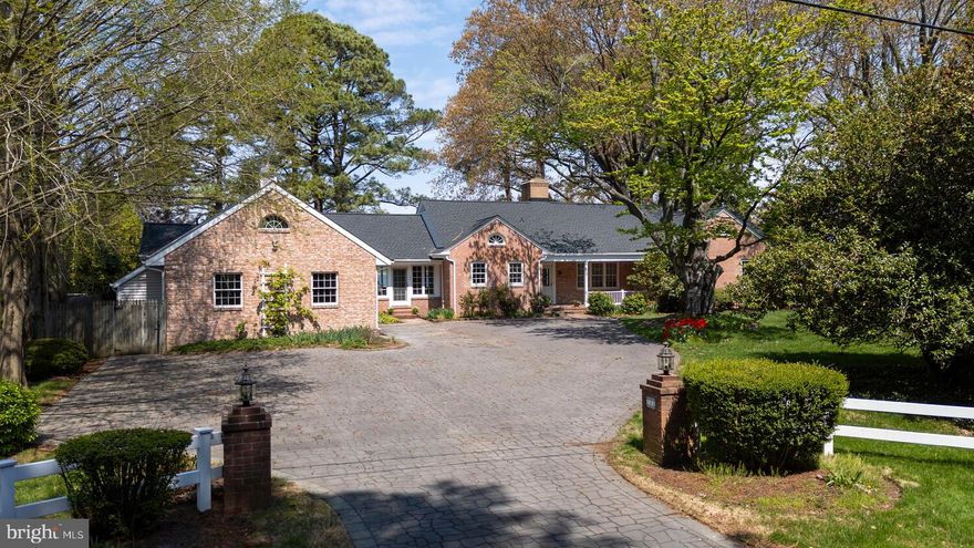 Breathtaking views of the Miles River and Chesapeake Bay Maritime Museum.  Once in a lifetime opportunity to buy a solidly built home  on almost an acre, within a few short blocks of downtown historic St. Michaels.  Located on the harbor and close to restaurants and shopping.   This 4 bedroom home is currently undergoing renovations.  The kitchen has cherry cabinets, Wolf appliances, Fisher& Payklel 2 drawer dishwasher, granite counters and new backsplash.  Huge primary bedroom and bath await your finishing touches.   Oak floors throughout.  Three additional bedrooms with ensuite bathrooms that are ready to finish. Tile has been purchased long with 2 vanities, one of which is installed.  Bathroom number 4 is almost complete.   Living room has a wood burning fireplace , plenty of light and fantastic water views.  Separate waterside dining room, private office and tile half bath recently completed. Expandable attic  and unfinished basement that houses  the mechanicals. 2 waterside decks.  New HVAC, Electrical work and plumbing is in place. As the house renovations continue the asking price will increase.  The current list price is for the house in current condition.  Minimal work needs to be done to complete the renovation. Don't miss  this great opportunity.