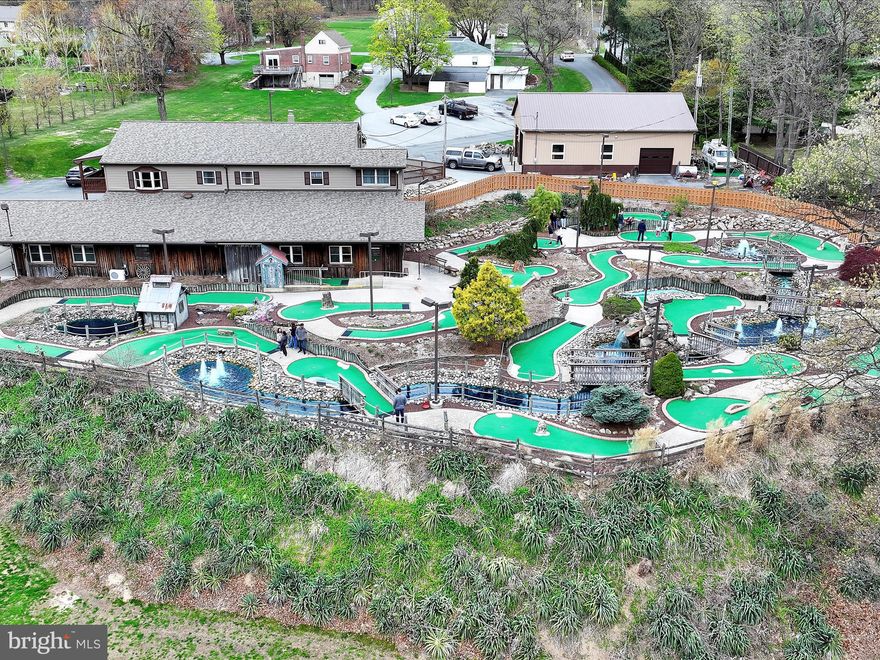 A rare opportunity awaits you. Gasser's Golf is now available to purchase. Owners are retiring after multiple decades and multiple generations of successful ownership. The sale will include the business and multiple pieces of real estate. The primary piece is the driving range, miniature golf, snack bar/pro shop, updated range and added mini golf in 2002 with owners residence above and 15 plus acres. Also included is address 3243 Pricetown Road - a 2400 square foot home (needs full rehab) sits on an acre lot with a wonderful stick built 2000 square foot detached garage/workshop with full power and heat. The final piece is a .13 acre lot that enhances the parking for this thriving golf entertainment operation. This operation is turnkey and offers a 19 tee box driving range, a 19 hole miniature golf course with multiple water features, a snack bar and pro shop featuring both hand dipped and soft serve ice cream and a putting green to sharpen your skills. The retails operation is supported by 45 parking spaces and full exterior lighting for extended operation. The owners residence above offers 3 bedrooms, 2 full bathrooms, a sure to please updated maple kitchen with granite tops, a living room, laundry room and dining area. Lower level offers a family room, office and utility maintenance area. The total finished area of this building is nearly 6000 square feet plus a nice covered owners deck on the west end with beautiful views of the facility. All this plus the 3243 detached residence could be rehabbed and turned into an income producing unit and 2 entrances/egresses to Pricetown Road on a C-1 and R-3 zoning lots. Properties are not connected to Alsace Township's public sewer system but lines have been run to close proximity of drain fields areas for future hookup if needed. Pavilion over tee boxes and outdoor seating area offers fluorescent lighting and ceiling fans, a 35 KW diesel generator to support a good portion of the operation in times of power outages and so much more make this the one to see! Schedule your tour today and don't let this opportunity pass you by.