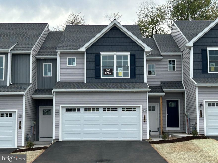 *$10,000 builder incentive; thru 4/30/26*  
UNDER CONSTRUCTION. This Bluebird model is a 3 BD, 2.5 BA, center unit townhome. You’ll soon discover the value of the many included features that are packed into this home. The open first floor plan will make entertaining family and friends a pleasure. Nine foot first floor walls make this home feel even more spacious. A self-cleaning electric range, granite counters and soft-close cabinet doors/drawers are featured in this kitchen. You will love all the storage available in the walk-in pantry. The entire first floor has luxury vinyl plank flooring. Check out the size of these bedrooms! The owner’s suite is sure to please with large spaces and lots of natural light. Bedrooms 2 and 3 have their own full bath. The laundry room is just steps from all bedrooms and bathrooms. This home also boasts a walk-out lower level, 10×12 composite deck, and a 2 car garage. 
- Interior photos are of a similar model. 
- All taxes are estimated since this is new construction and has not yet been assessed.