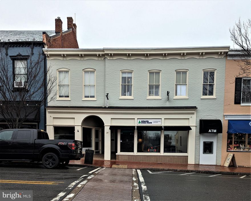 Bright upstairs office space conveniently located off Main Street.  Recently renovated and freshly painted, new luxury vinyl plank flooring and new private half bath.   Currently offers one separate office area or conference room, 3 half walled workstations, reception area and storage area/printer room with shelving.  Two parking spaces at rear of the building with street parking and several surrounding municipal parking lots.   Lovely office space for a great work environment.  Located close to Post Office, Courthouses, restaurants, shopping and other offices.  Shared entry hallway and stairs right off Main Street. Tenant pays electricity, shared cost of common area maintenance, water and tenant's renters insurance policy.