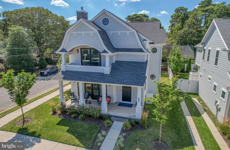 Coastal elegance and convenience describe this beautiful custom home located just a block to Rehoboth’s finest beaches and iconic boardwalk. Situated on the corner of King Charles and Rodney Street, this chic coastal style elevation is sure to grab your attention. Exterior accents include Hardie shake siding, gambrel roof-lines and a large welcoming front porch. This sought after and functional, open concept floor plan features 5 bedrooms, 5 full baths, and 1 half bath. Soaring 10’ ceilings on the first level allow for an abundance of natural light that beautifies the timeless finishes including wide plank walnut floors, gas fireplace with shiplap and tile surround, oil rubbed bronze fixtures, unique coffered ceilings and more. The kitchen offers tons of cabinetry, a commercial grade appliance package by DACOR, sleek quartz counters, a walk-in pantry, and an oversized island. The kitchen opens up to a rear sun deck offering a prime spot for grilling and relaxing. The first level also includes a primary suite complete with an en-suite bath, laundry room (hook-up only), and access to the rear deck. The second level features 9’ ceilings, 4 additional bedrooms each with en-suite baths, laundry closet with stackable washer/dryer, and a loft area with access to a private balcony, which is a perfect cozy second living space. Being sold fully furnished, this home could be enjoyed immediately! This property has never been rented but offers excellent potential.
