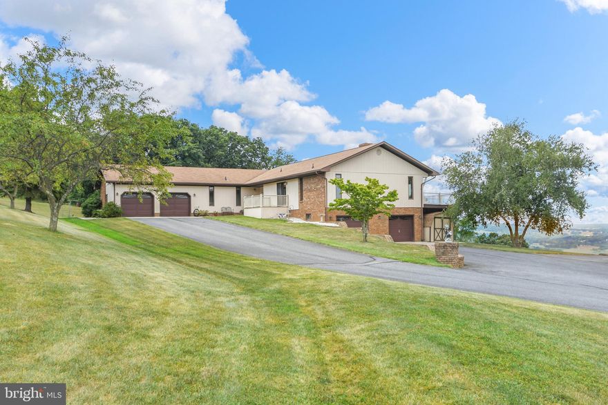 Seller is actively seeking back-up/ kick-out contracts. Please continue to show. 
This one of a kind property is situated on South Mountain with 40 mile views and 23 gorgeous acres. The high quality custom rancher offers 4 bedrooms, 3.5 bathrooms, office, flex space, 4 car attached garage, finished walkout lower level with wet bar, stone hearth and wood stove.

The main level offers hardwood floors, granite countertops, custom quality stained grade trim and tongue-in-groove ceilings. This level of quality is rarely seen in today’s construction. This home has been lovingly maintained throughout the years. There are opportunities to update some finishes to suit your taste.


The outdoor living areas are excellent with several large decks and balconies running the length of the home and concrete patio around the home and the salt water pool. What a wonderful place to spend those hot summer days.

The fields are currently producing hay but could easily be converted to an equine operation, beef cattle production, sheep or goats. The fertile soil around Boonsboro is also known for producing high quality fruits and vegetables including grapes, melons and cantaloupe.

This estate is conveniently located close to restaurants, schools, shopping, and commuter routes .The property is 6.4 miles (10 minute drive) to the Main Cup Restaurant in Middletown, Md. And 2.8 miles (6 minute drive) to the Weis Market Shopping Center in Boonsboro, Md.

The property offers 4 barns, pole barns and storage buildings. One is currently used to store hay and features a haymow. This barn could easily be converted to animal stalls. One building is heated and currently used for automobile repair. Another is set up for the storage of farm equipment and general items. The fourth is currently used to store RV’s, jet ski’s, motorcycles etc. This property offers many opportunities for entertaining, weekend getaway, Air B’N’B or full-time residence.

There are multiple opportunities for income such as storage rental, short term rental, farming or fruit, vegetable or grape production.
The property is being sold "as is, where is".
OWNER FINANCING POSSIBLE FOR QUALIFIED BUYR AT THE SOLE DISCRETION OF SELLER.