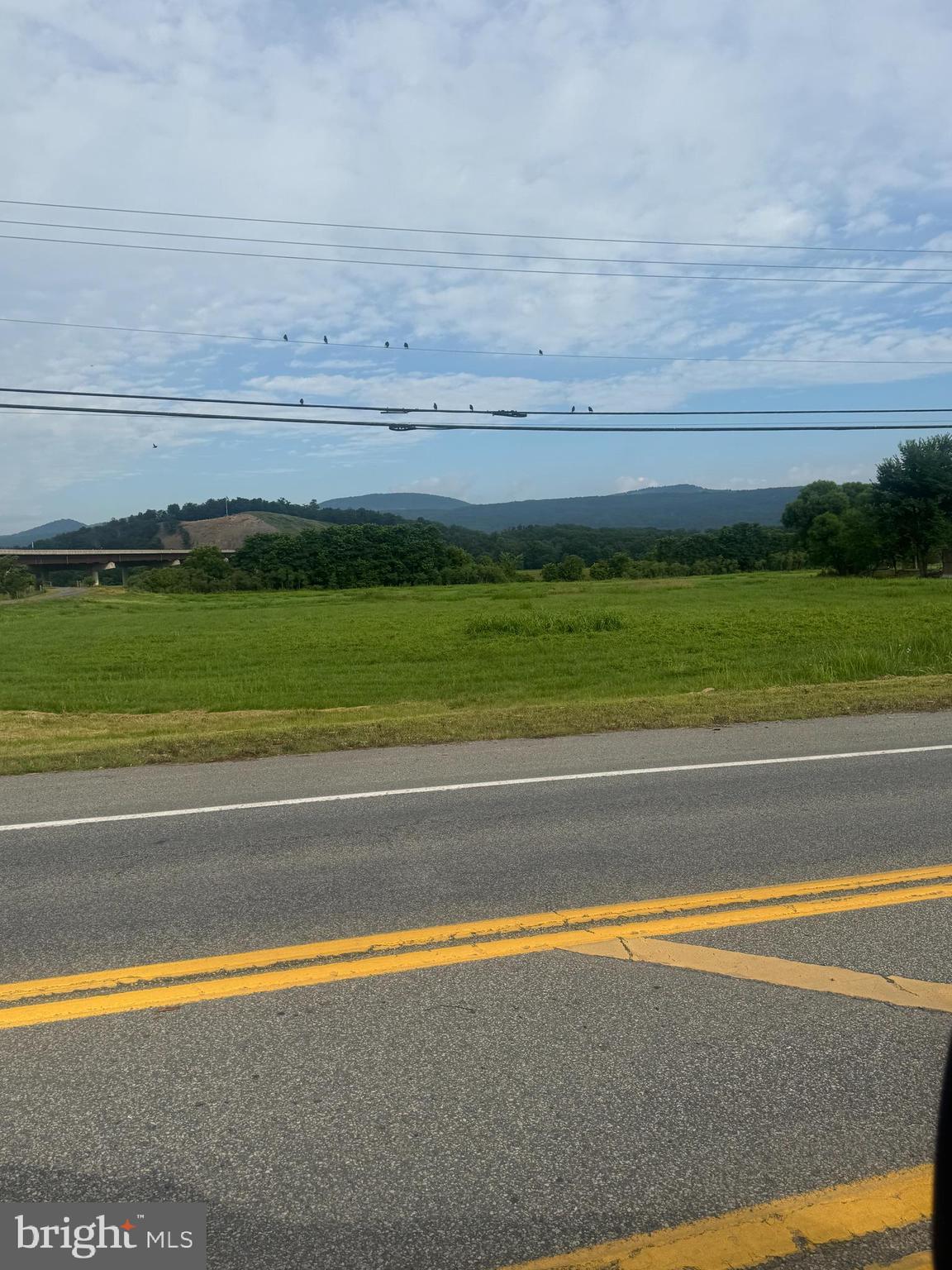 Opportunity, Opportunity! 1+ acres located in the "happening" place of Moorefield. Commercial property in sight of Moorefield off ramp of Corridor H (Rt 48). This building lot is flat, has great potential for a variety of uses. Prime locations for any up and coming businesses.
