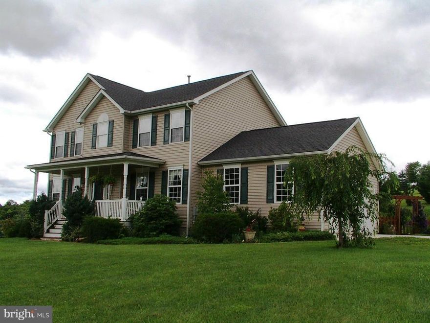 PRICE JUST REDUCED! Immaculate home shows pride of ownership! Enjoy the cozy front porch, & the enchanted arbor &stone patio & garden. Lovely family room with stone fireplace. Gourmet kitchen w/island, tile floors and recessed lighting. Shadow boxing. Inviting master suite w/master bath suite with garden tub. Finished basement for added living space. Dual HVAC,